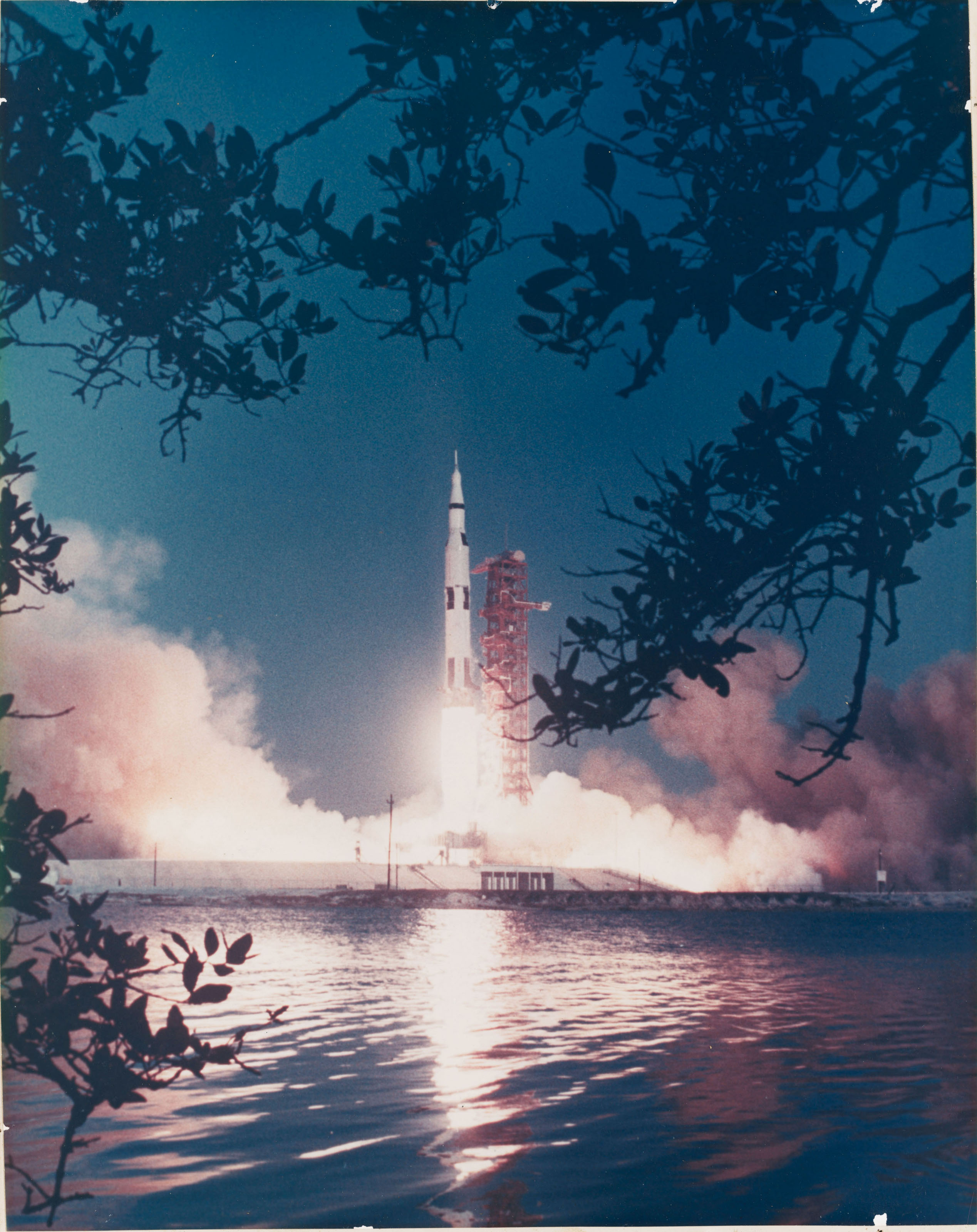 Launch of the second Saturn V rocket [Large Format]; Sun glint over the