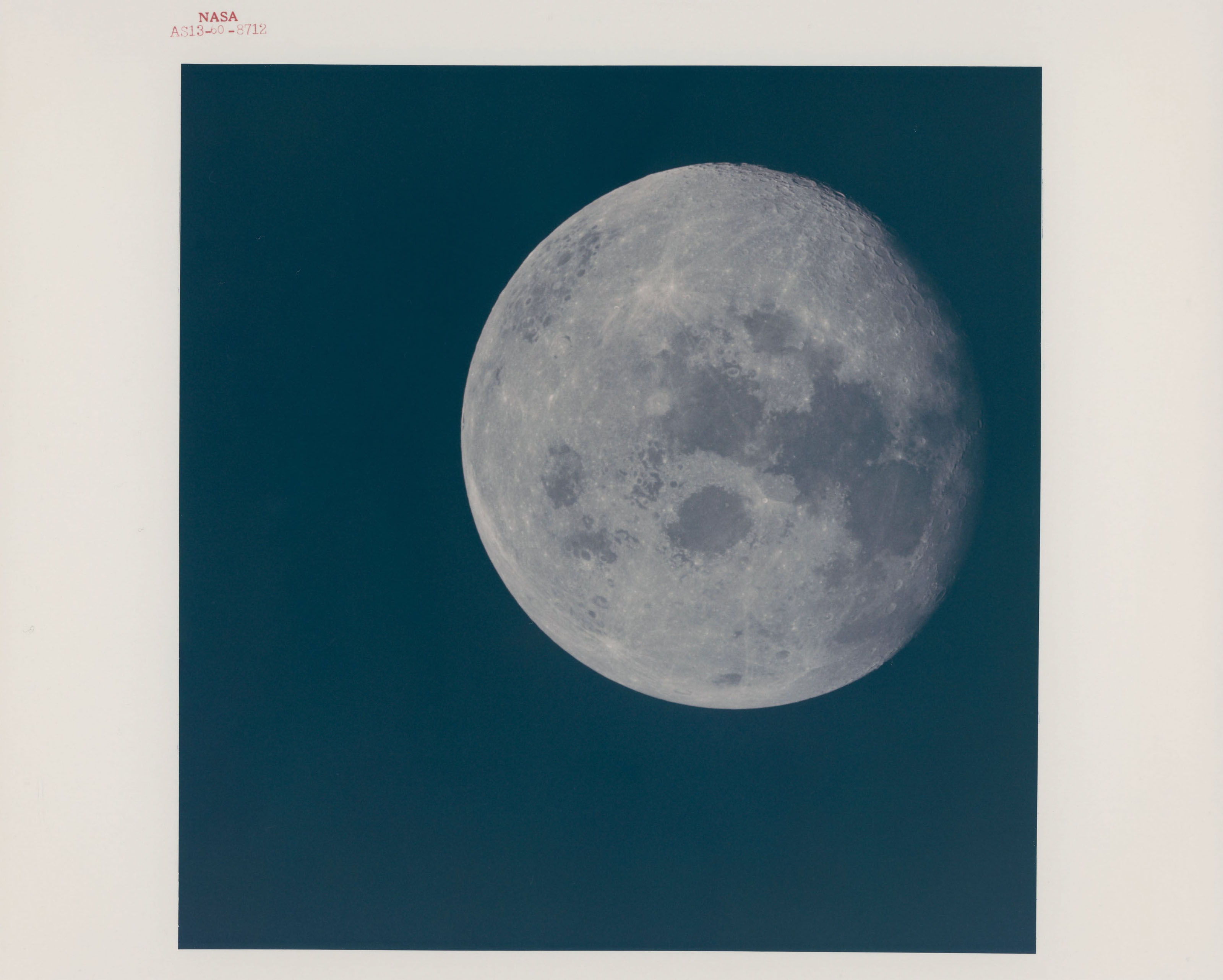 Telephotographs of the nearly Full Moon; the Earth after the slingshot