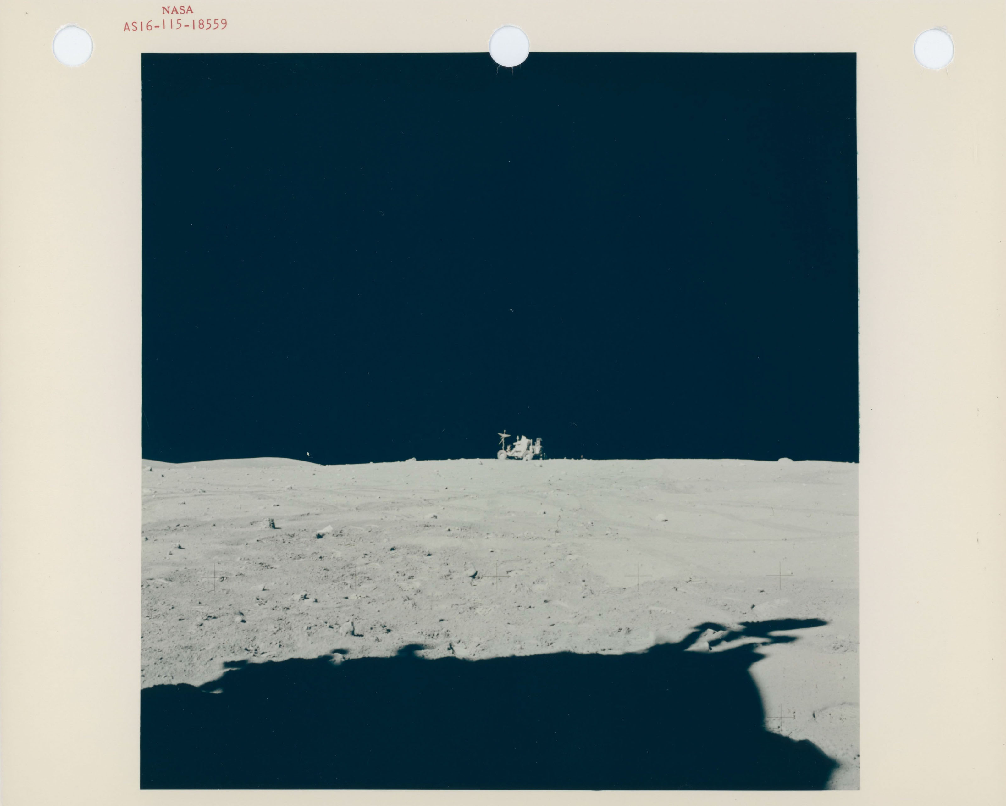 Views of John Young driving the Rover back to the LM; TV pictures of