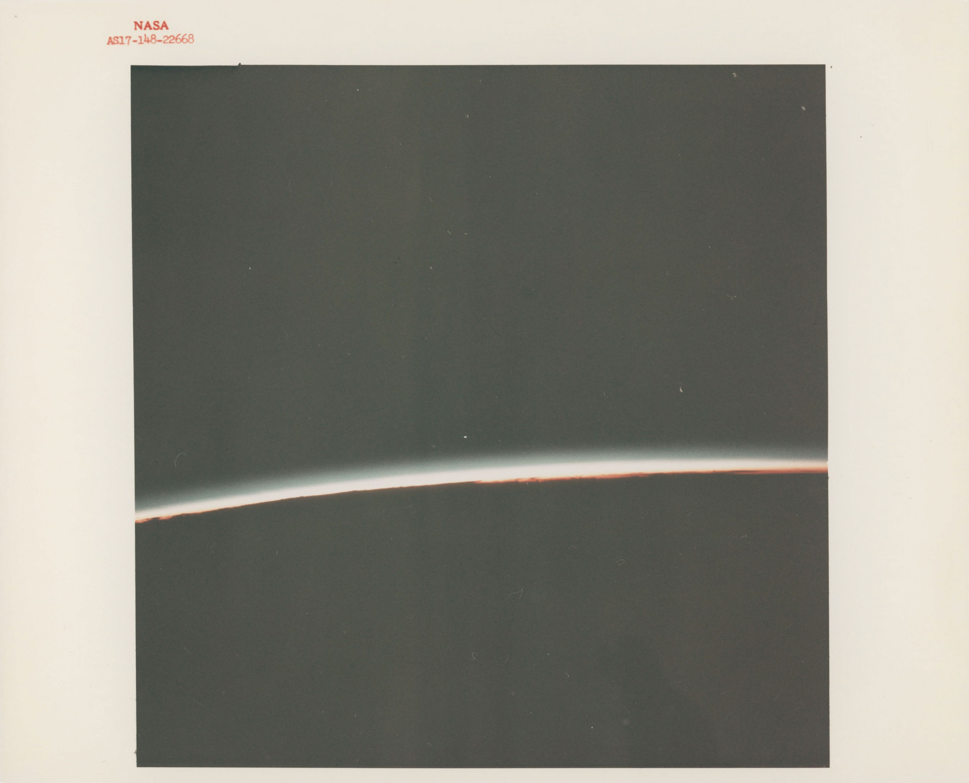 The limb of the Earth during translunar injection; the SLA panels ...