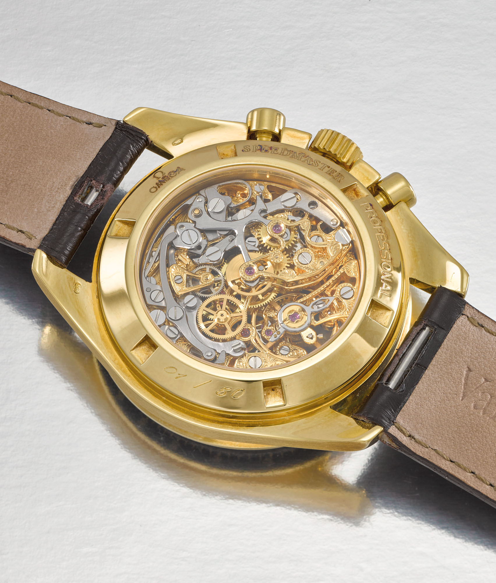 OMEGA. A VERY FINE AND RARE 18K GOLD LIMITED EDITION SKELETONIZED