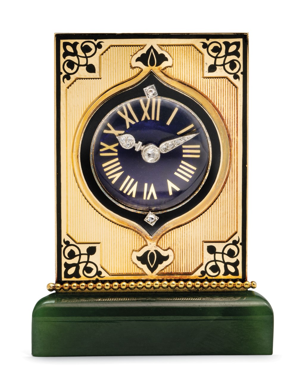 ART DECO NEPHRITE JADE CLOCK, CARTIER, | Christie’s
