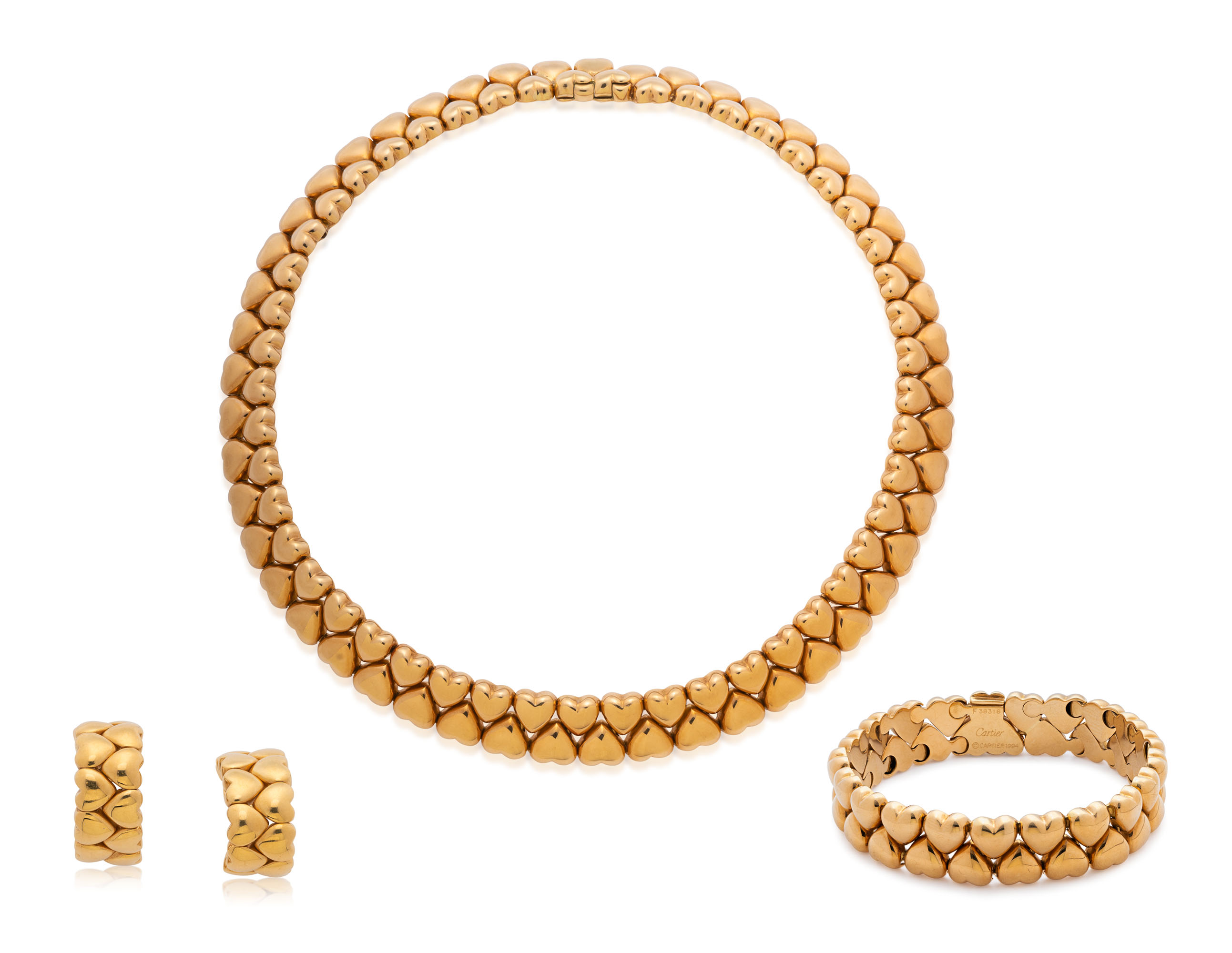 CARTIER GOLD NECKLACE, BRACELET AND EARRING SUITE, Christie’s