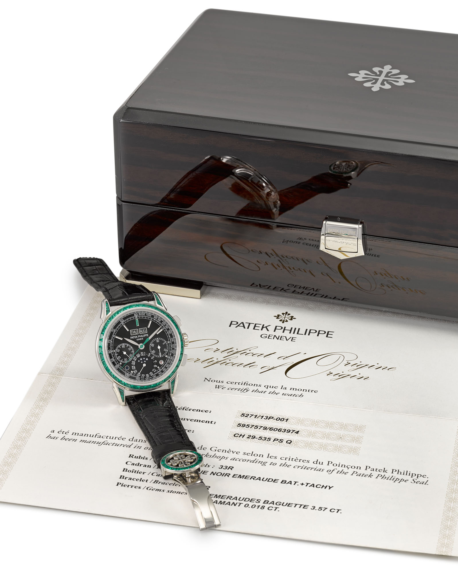 PATEK PHILIPPE PLATINUM AND EMERALD SET PERPETUAL CALENDAR