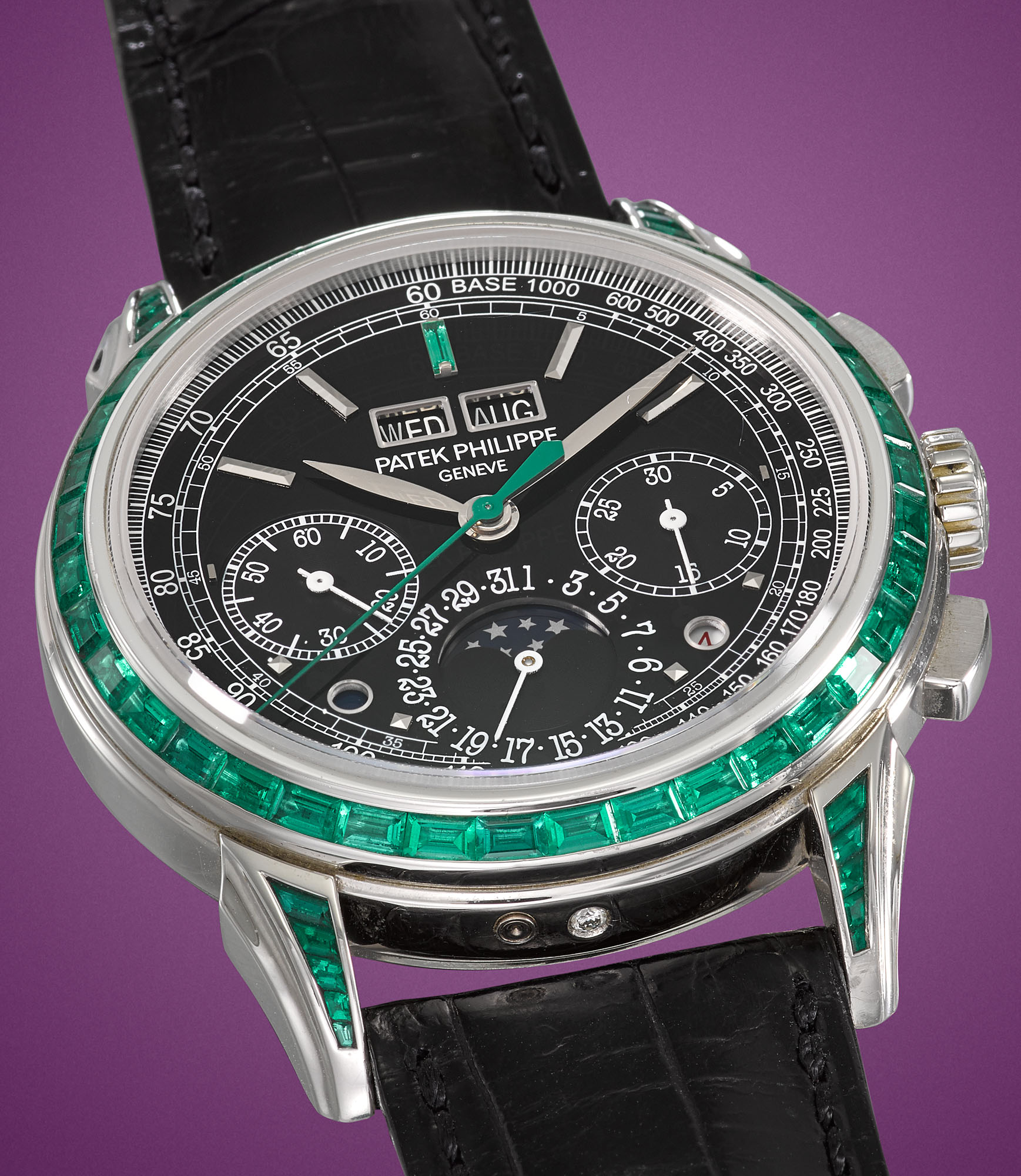 PATEK PHILIPPE PLATINUM AND EMERALD SET PERPETUAL CALENDAR