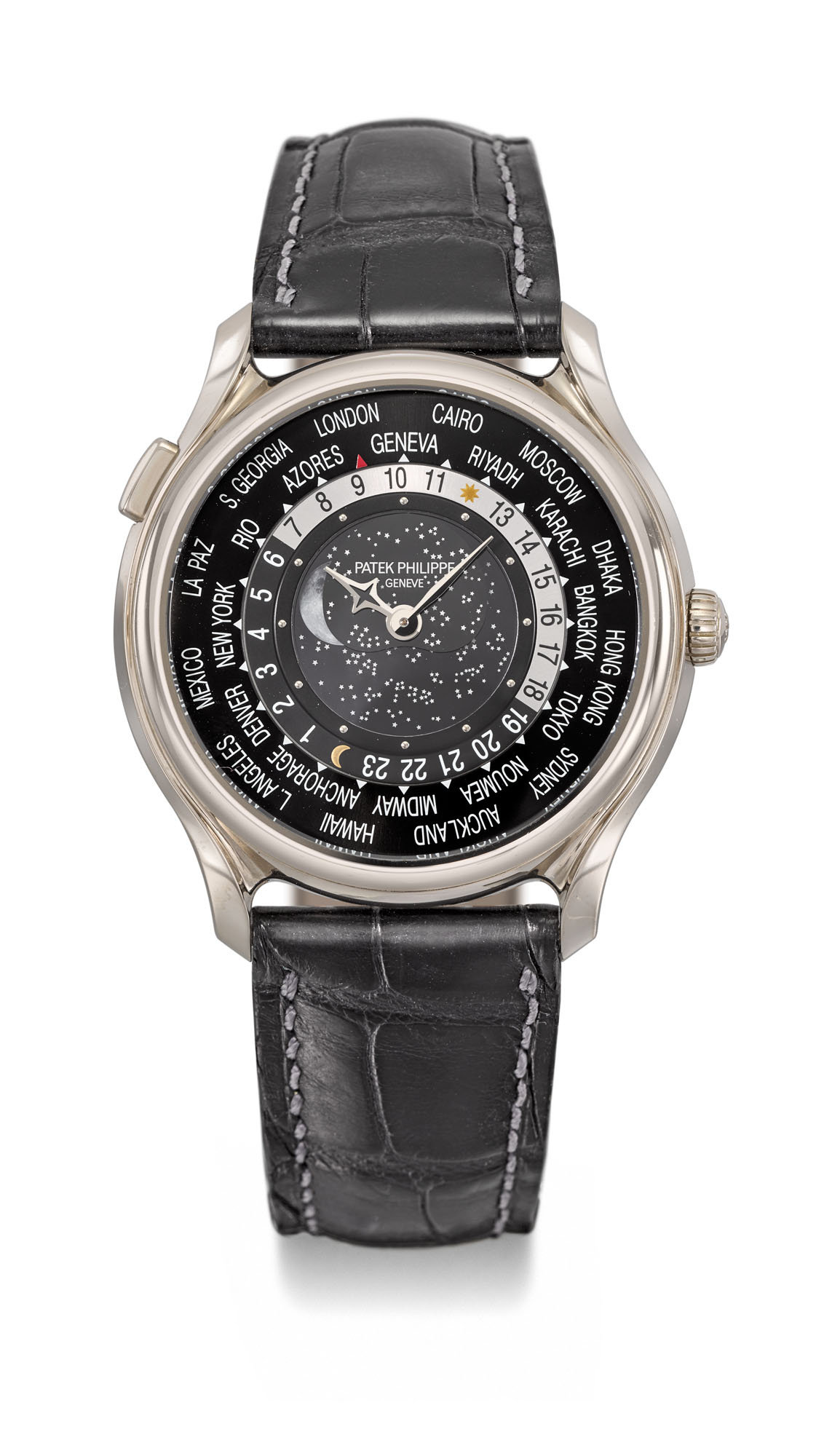 PATEK PHILIPPE WHITE GOLD LIMITED EDITION WORLD TIME WRISTWATCH WITH MOON PHASES MADE TO COMMEMORATE THE 175TH ANNIVERSARY OF PATEK PHILIPPE REF. 5575G MOVEMENT NO. 5 908 597 CASE NO. 6 064 470 Christ...