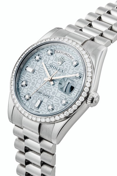 ROLEX. A PLATINUM AND DIAMOND-SET AUTOMATIC WRISTWATCH ...
