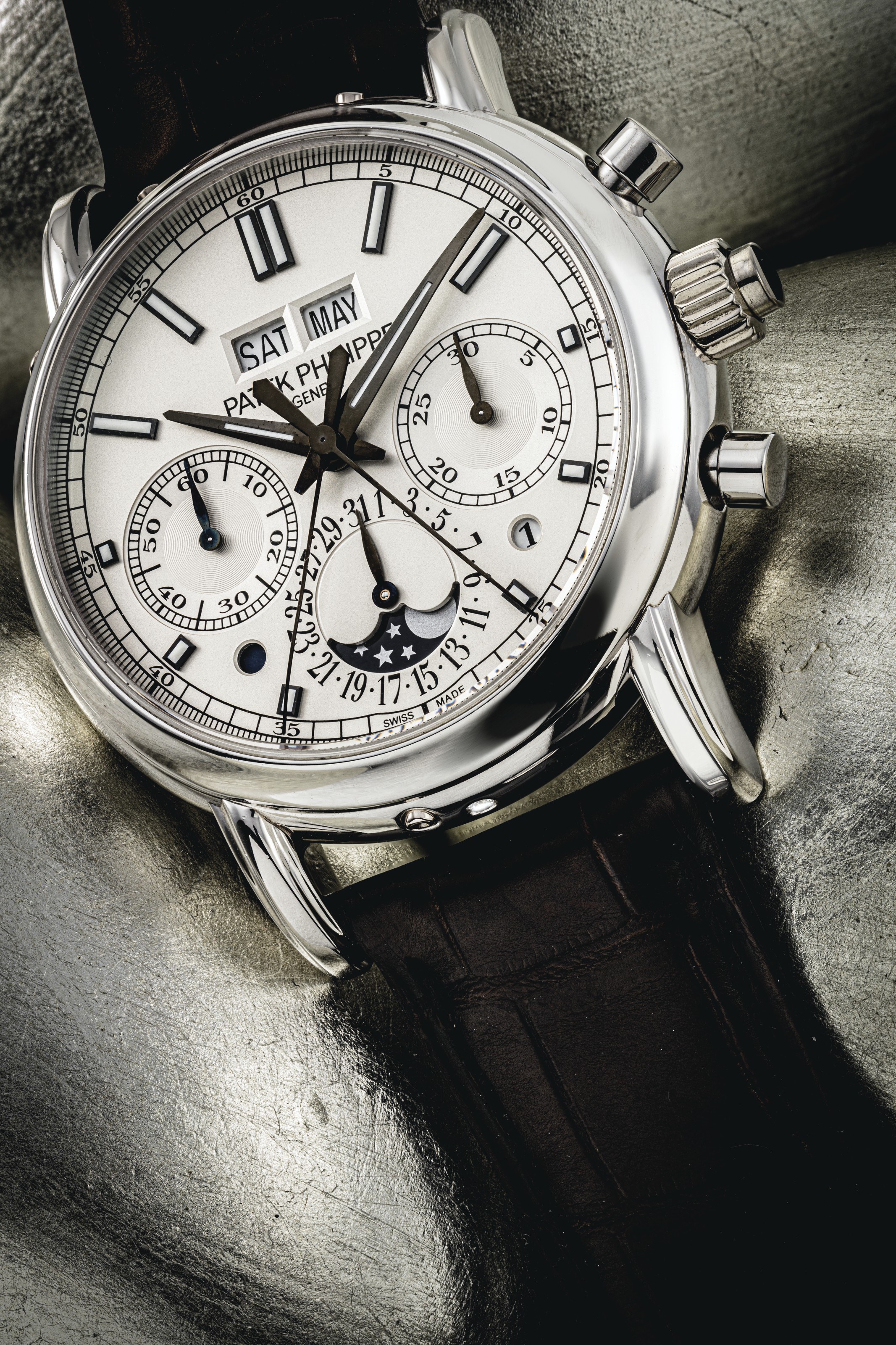 PATEK PHILIPPE. A RARE PLATINUM PERPETUAL CALENDAR SPLIT SECONDS