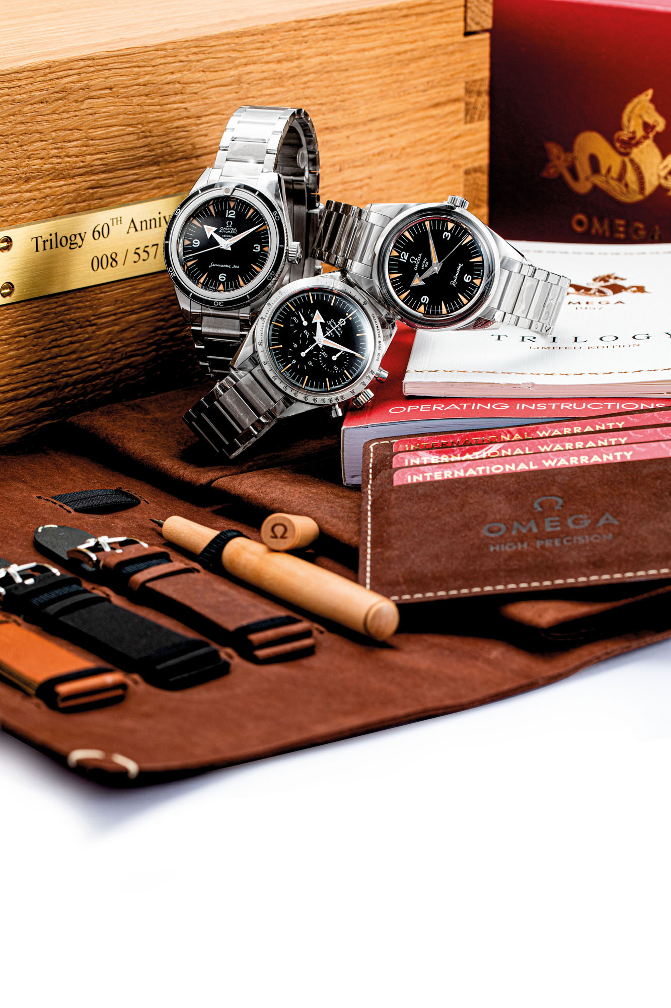 OMEGA. A RARE SET OF THREE STAINLESS STEEL LIMITED EDITION