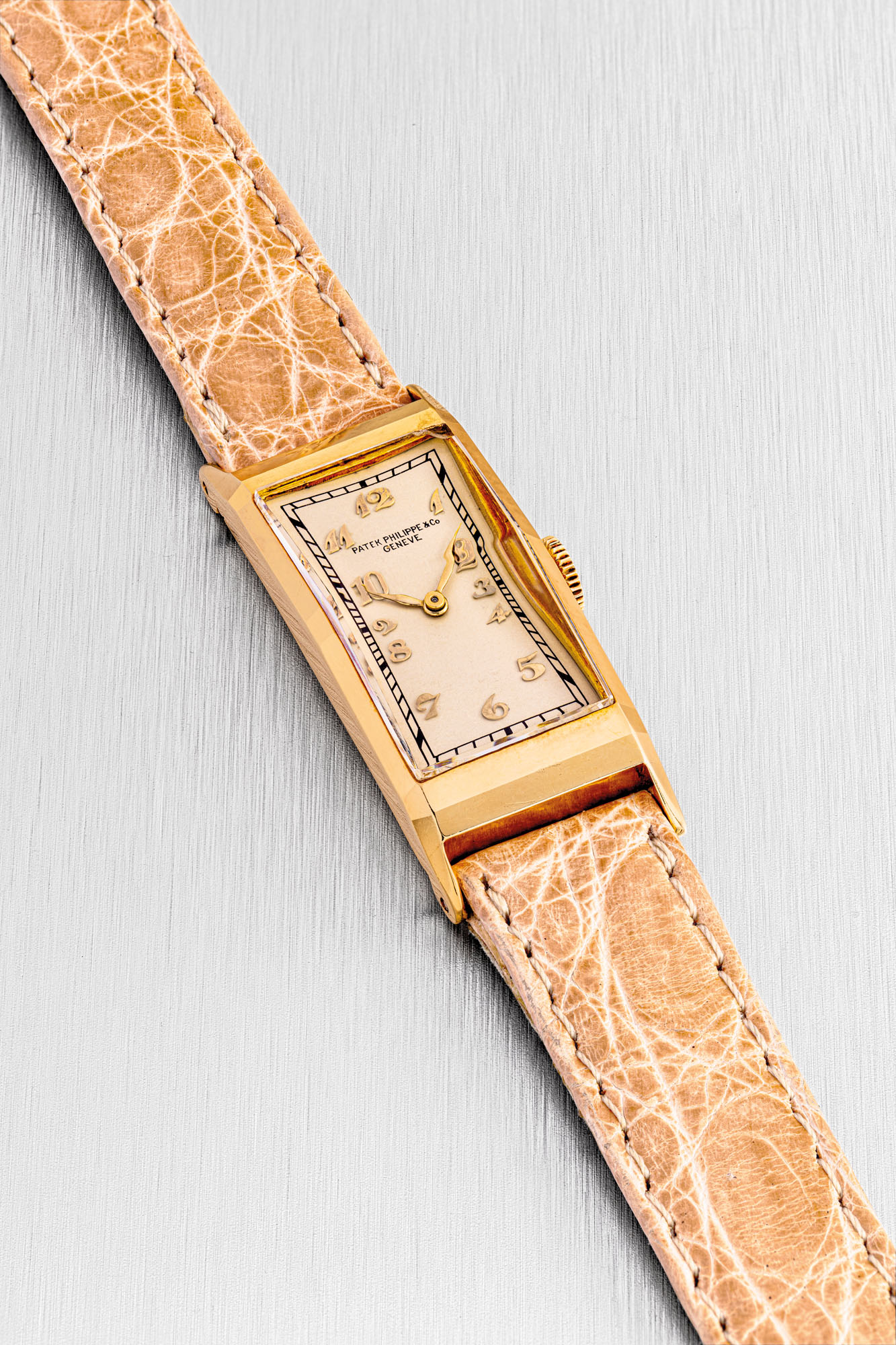 PATEK PHILIPPE. A LADY’S 18K GOLD RECTANGULAR WRISTWATCH , REF. 138 ...