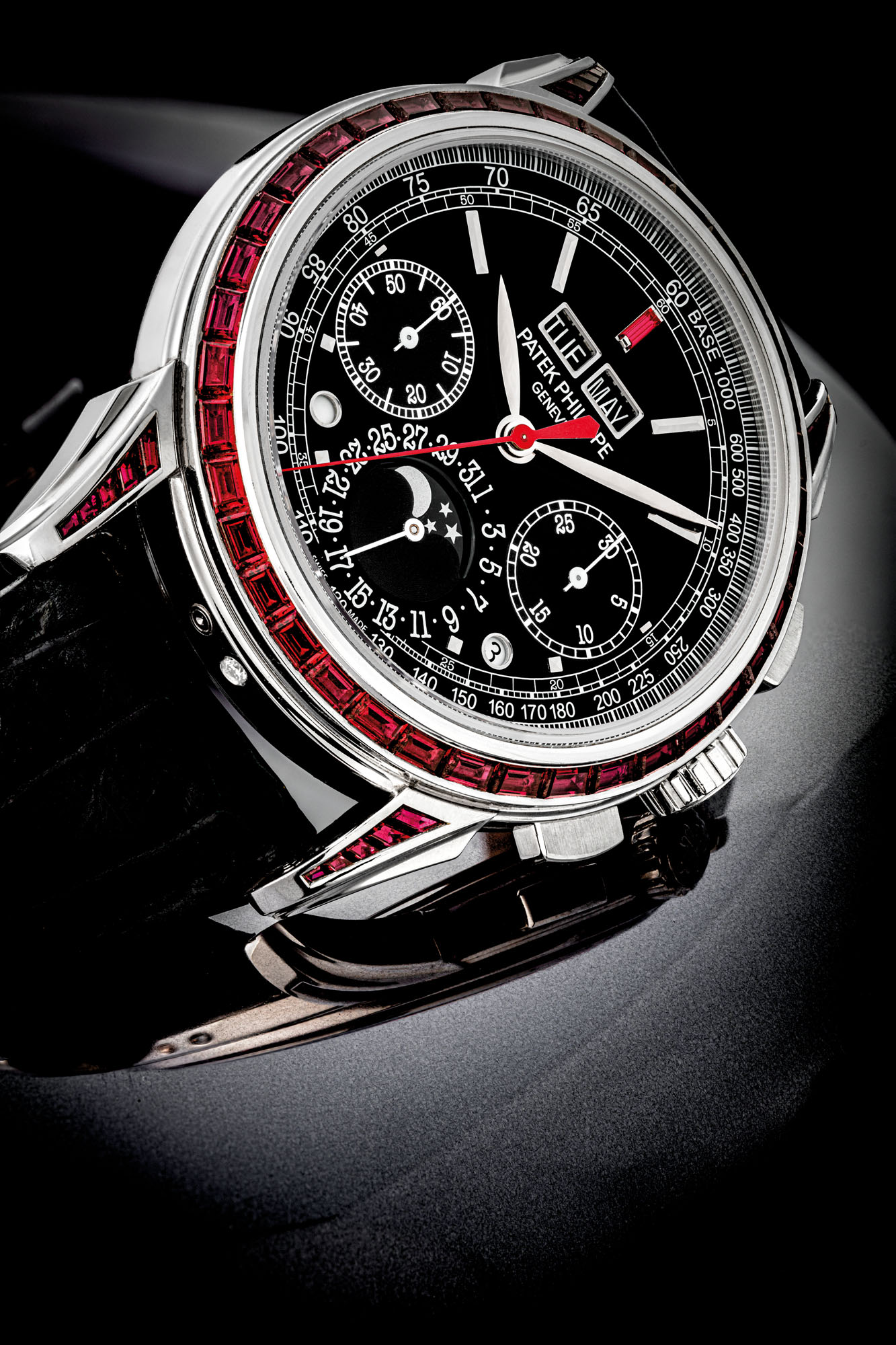 Patek Philippe An Impressive And Very Rare Platinum And Ruby Set Perpetual Calendar Chronograph Wristwatch With