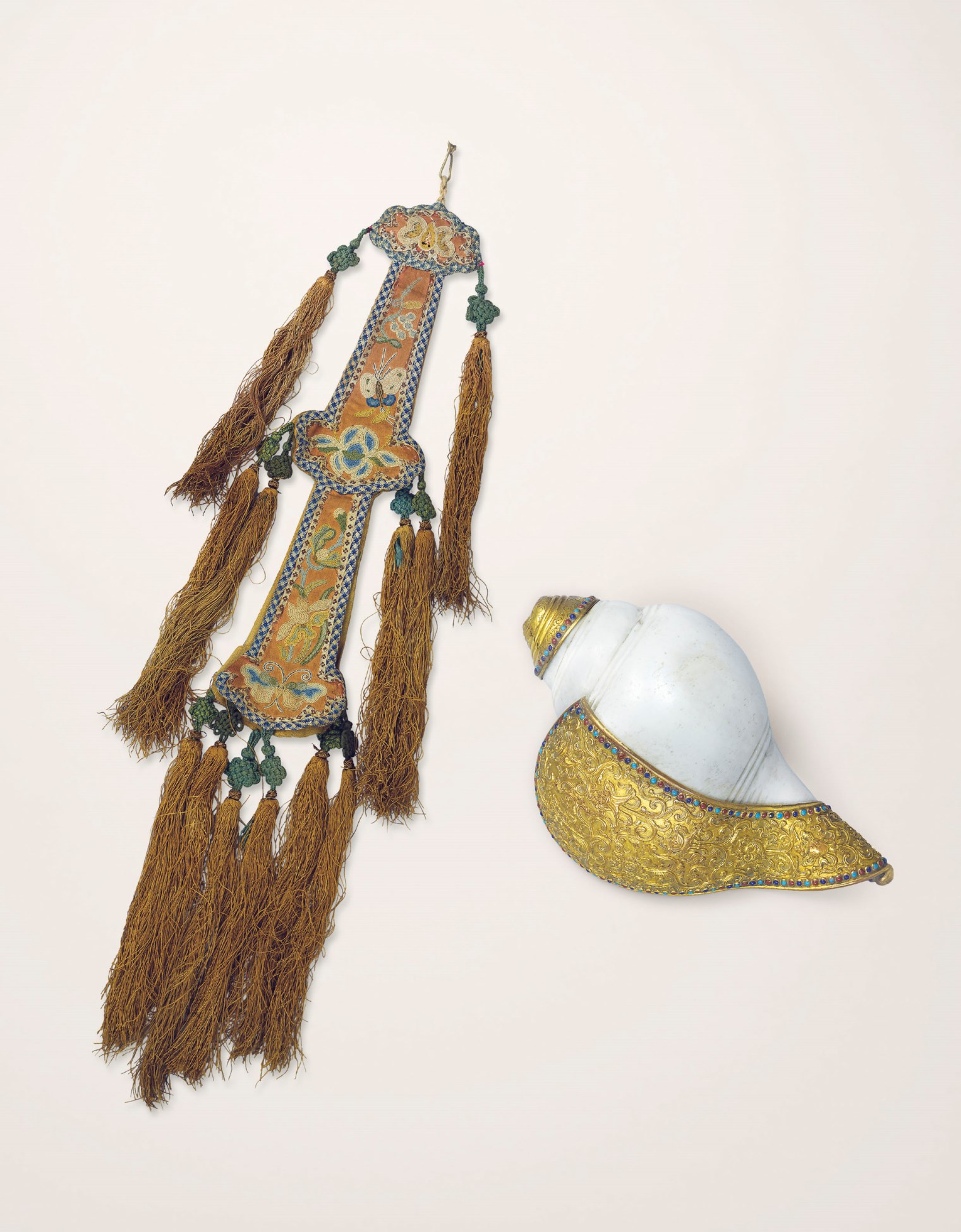 A RARE CONCH SHELL WITH GILT-COPPER REPOUSSÉ AND ENAMEL-INSET MOUNT ...