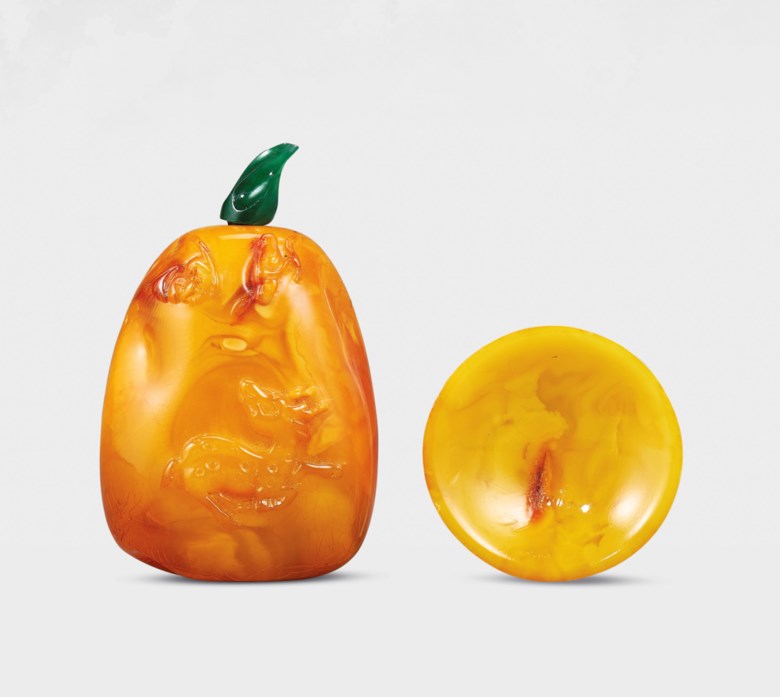 A carved amber &lsquo;stag and bat&rsquo; snuff bottle, the Amber Pebble Master, Qing dynasty, 1740-1860. Bottle 2⅛ in (5.3  cm) high, jadeite stopper, dish 1&frac12;  in (3.8  cm)  diam. Estimate HK$260,000-500,000. Offered in Chinese Snuff Bottles and Matching Dishes from Private Collections on 8 October 2020 at Christie&rsquo;s in Hong Kong