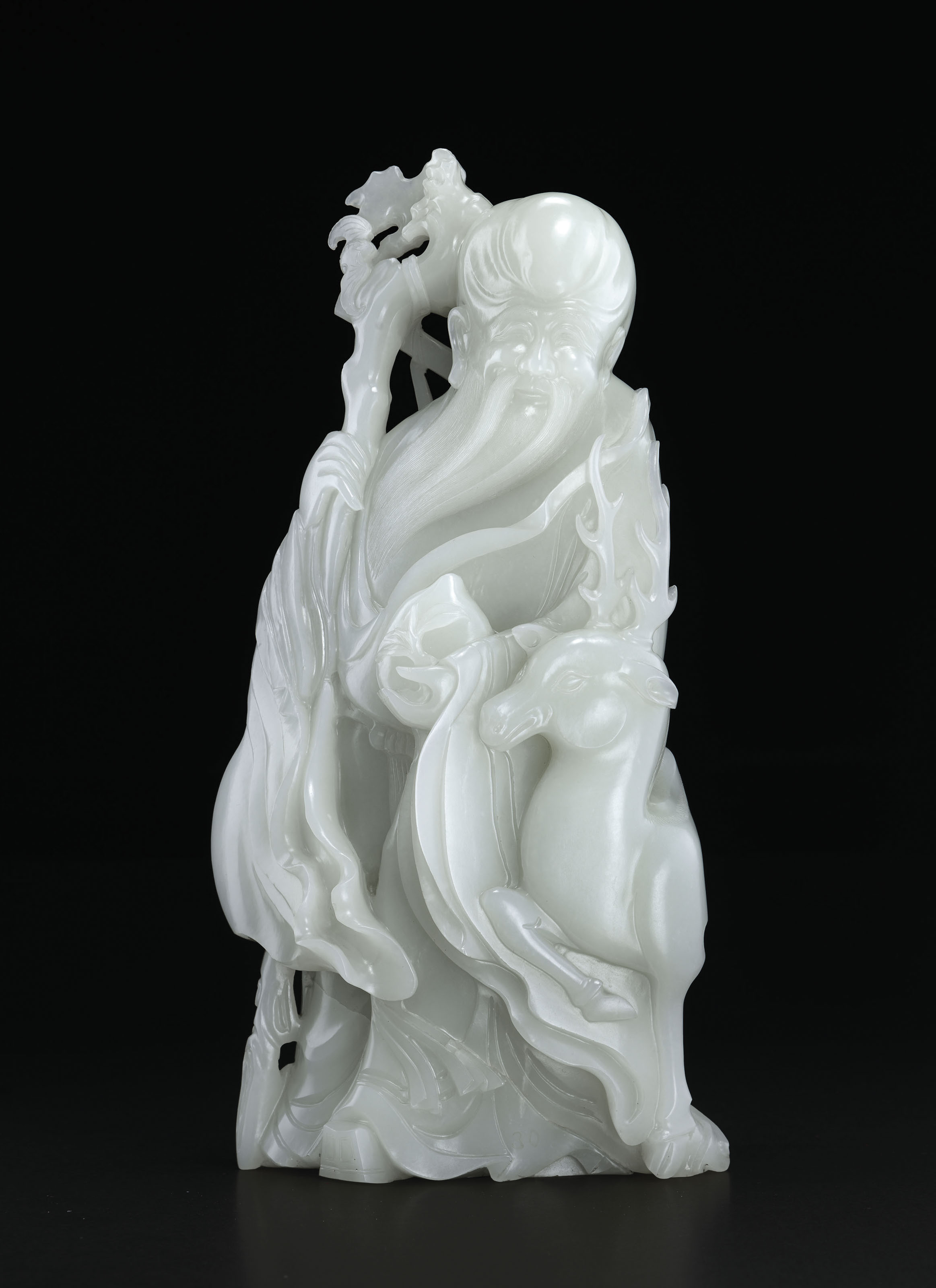 A MAGNIFICENT AND EXCEPTIONALLY RARE LARGE WHITE JADE CARVING OF