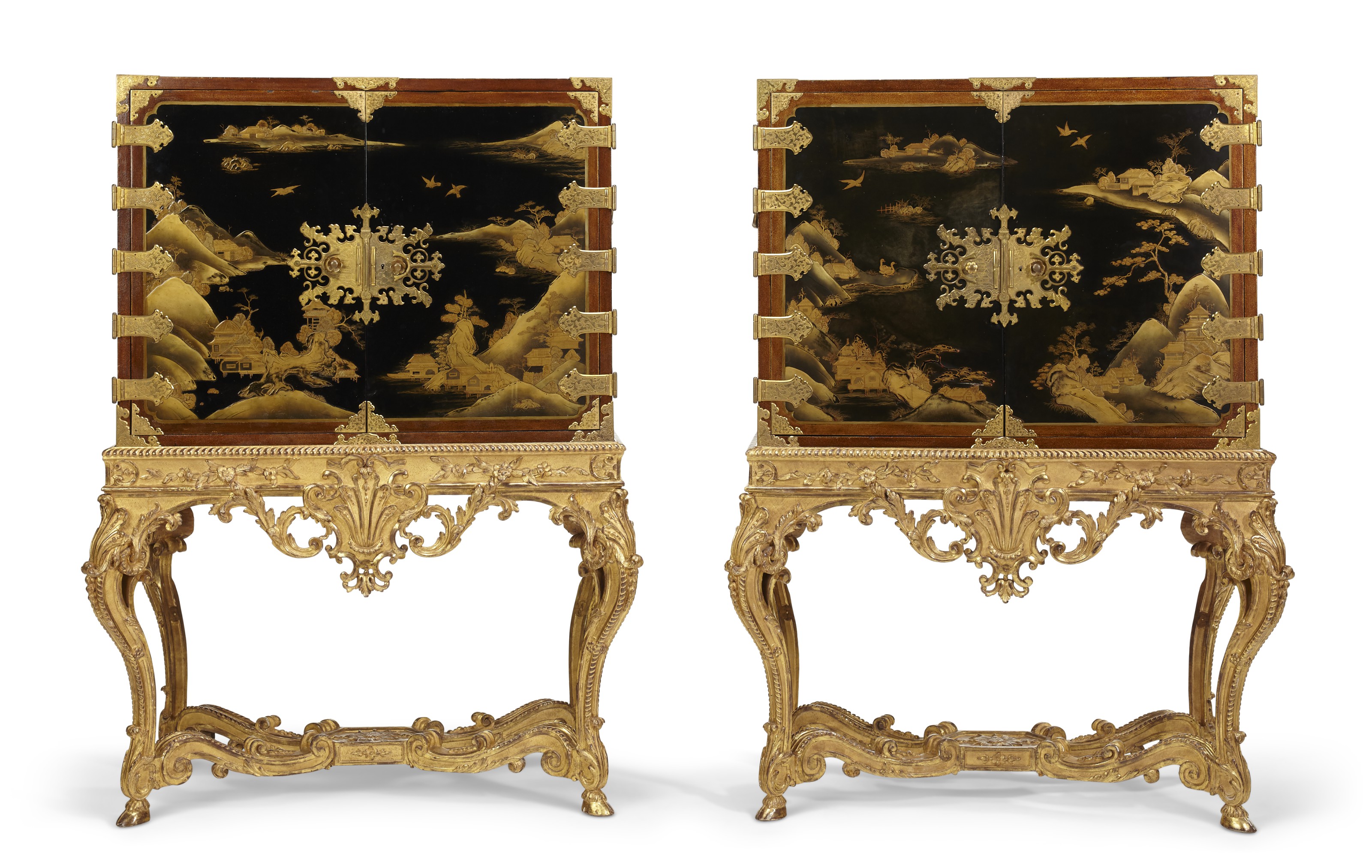 A PAIR OF JAPANESE LACQUER CABINETS ON GILTWOOD STANDS, THE