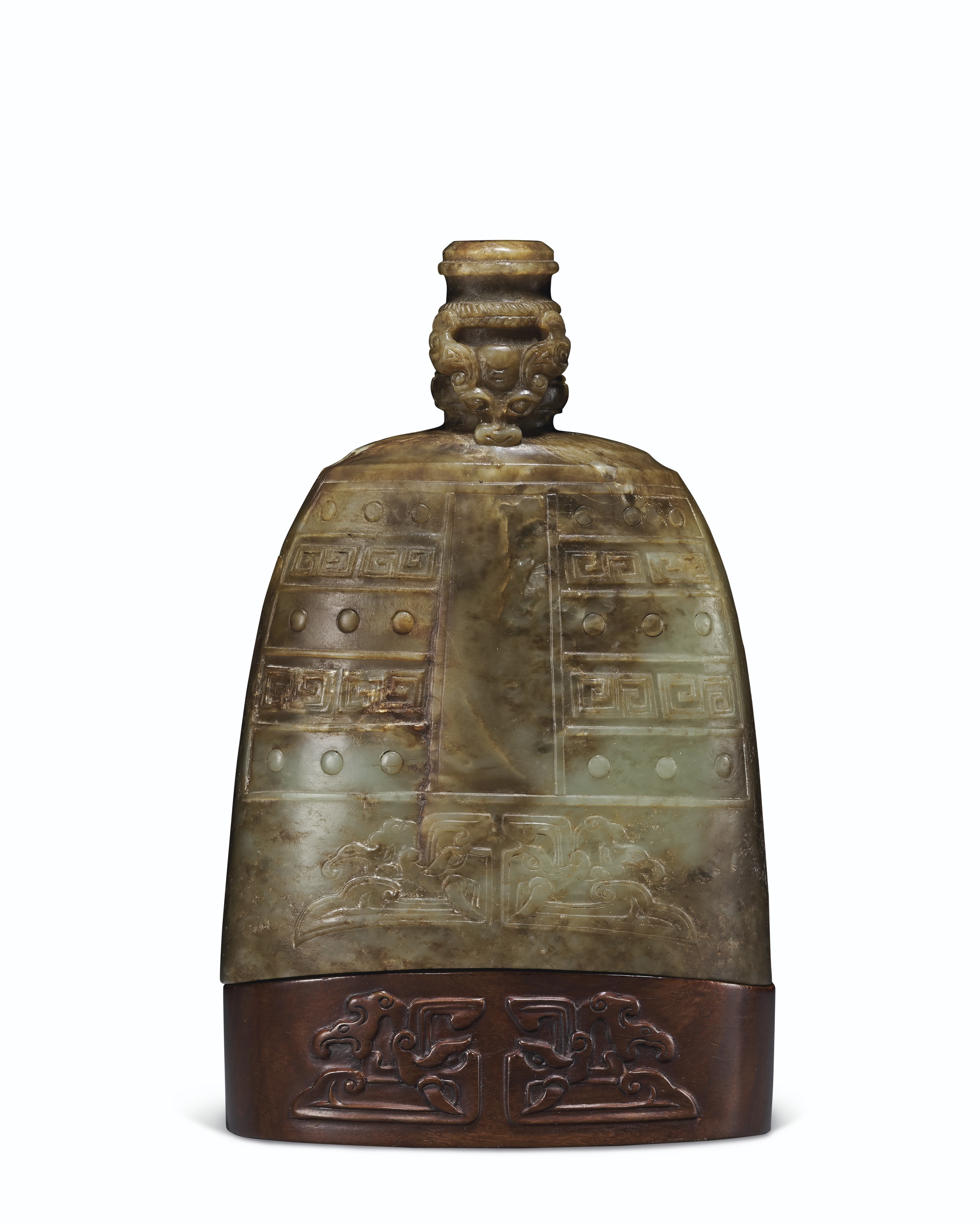 清仿古蛇紋石瑞獸鈕鐘擺件, QING DYNASTY (1644-1911) | Christie's