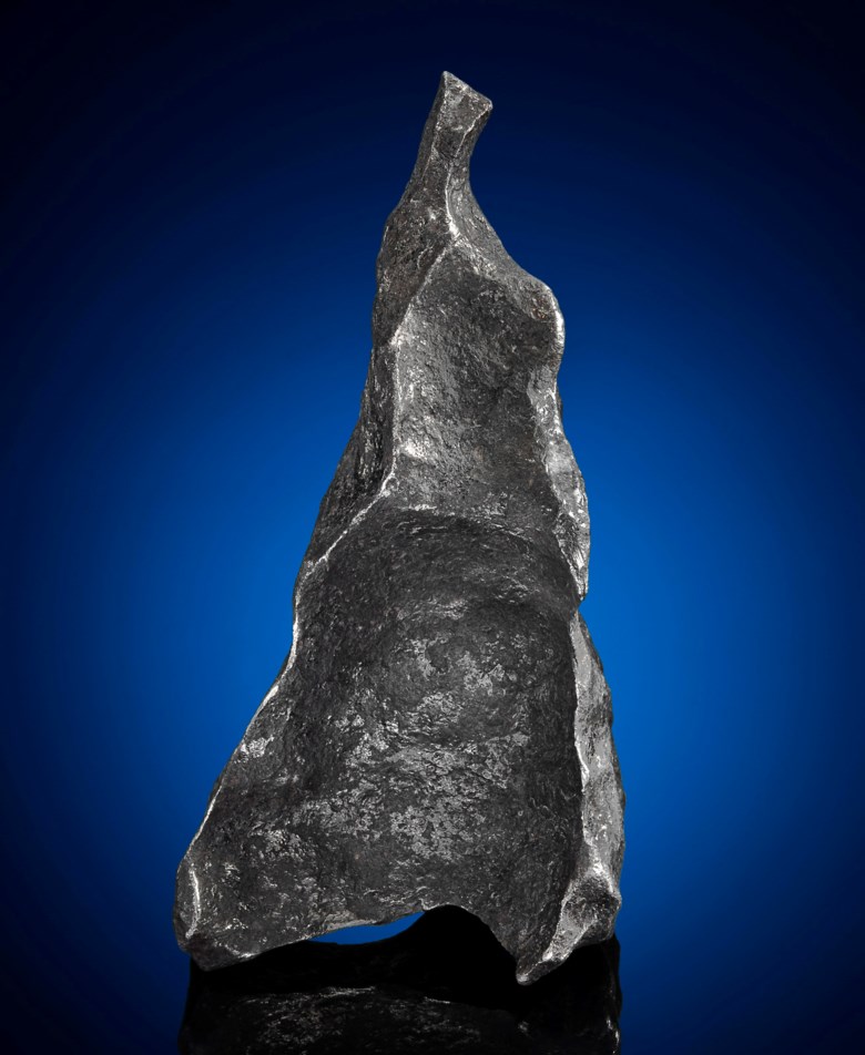 Gibeon meteorite, iron, Group IVA, fine octahedrite. Gibeon, Great Nama Land, Namibia. 140 x 73 x 77 mm (5.5 x 2.75 x 3 in). Estimate $3,000-5,000. Offered in
Deep Impact Lunar and Rare Meteorites, 12-25 August 2020, Online