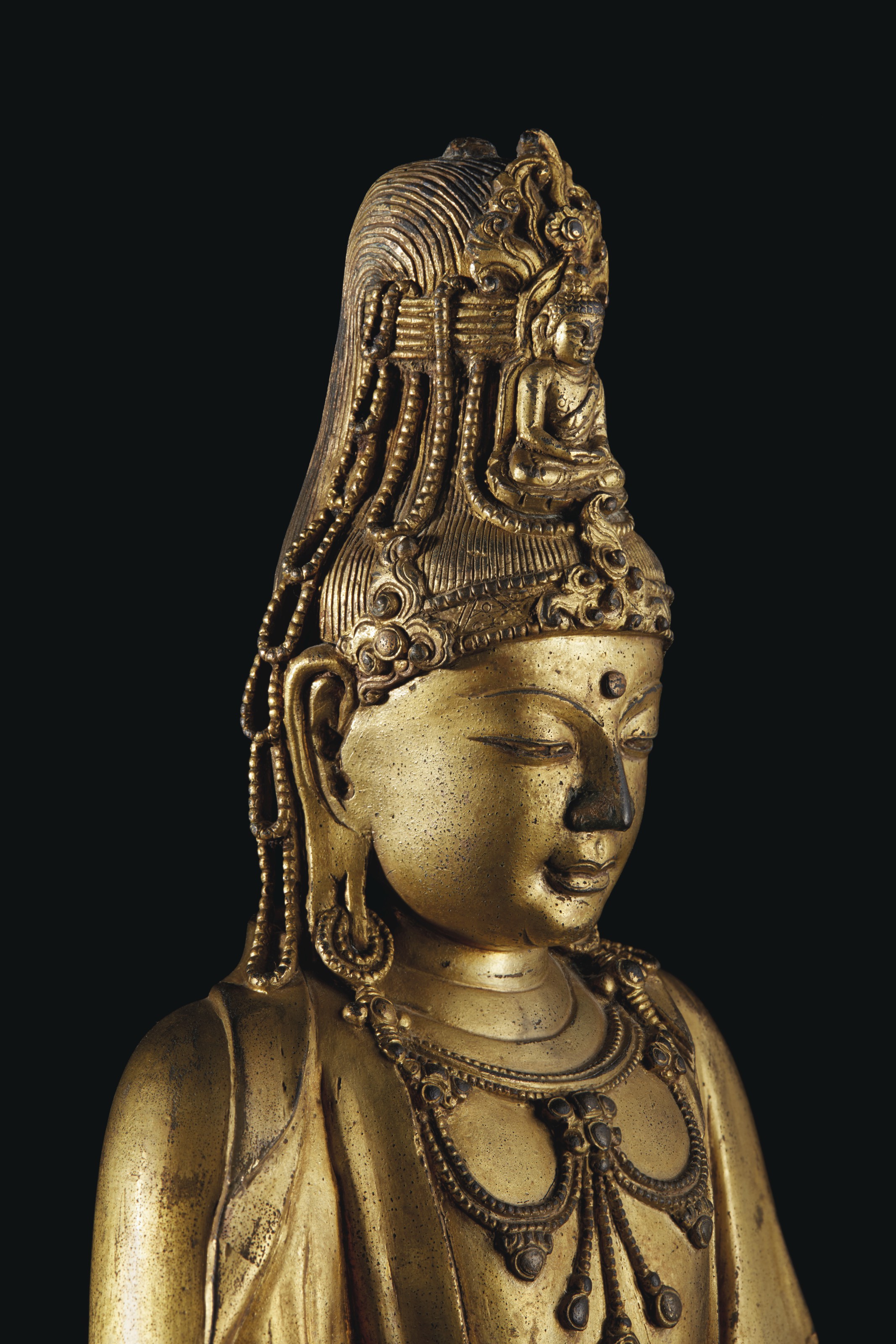 A VERY RARE GILTBRONZE FIGURE OF SEATED GUANYIN , 17TH18TH CENTURY