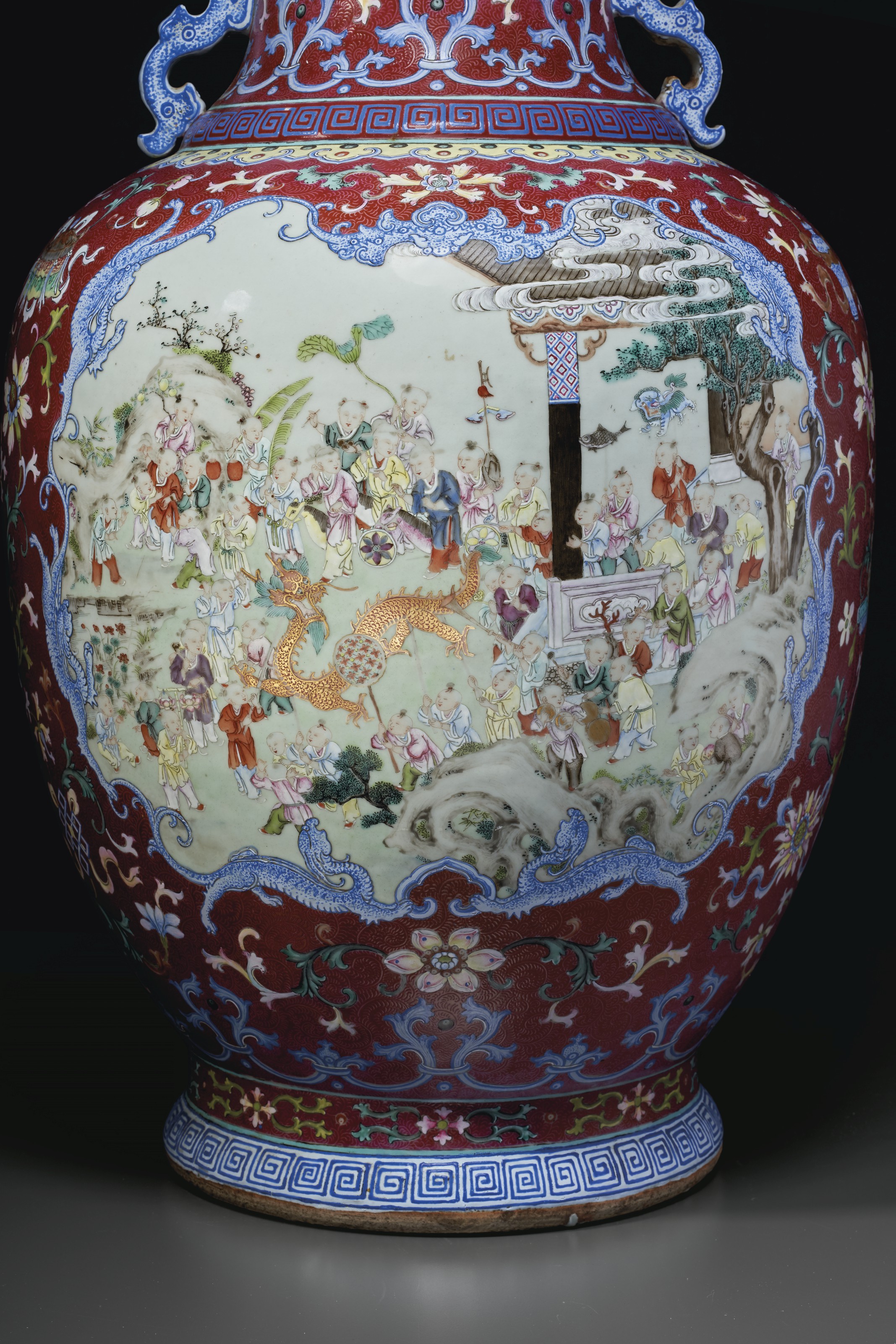 A RARE MASSIVE FAMILLE ROSE SGRAFFIATO RUBYGROUND 'HUNDRED BOYS' VASE