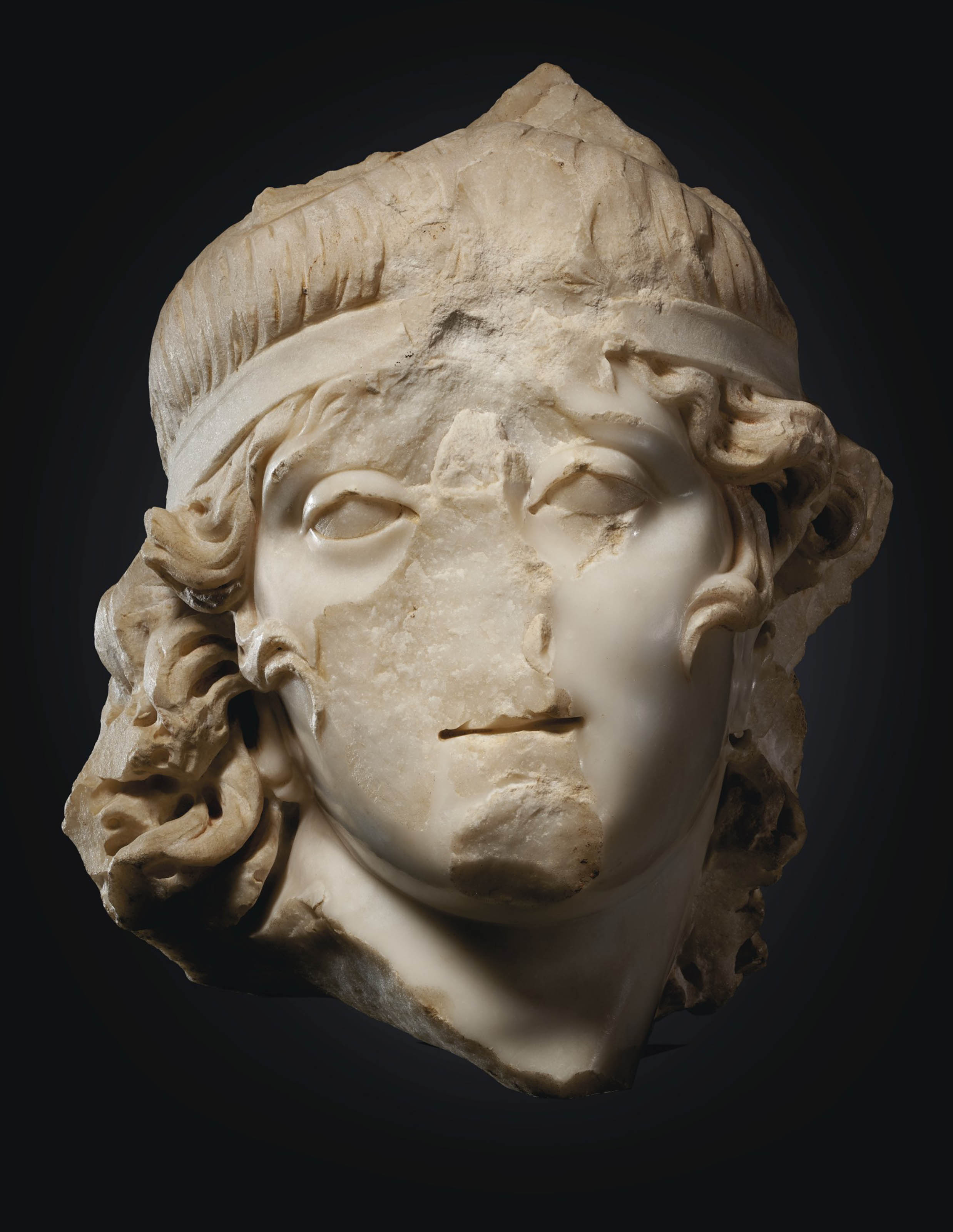 A ROMAN MARBLE HEAD OF A YOUTH , CIRCA 2ND 3RD CENTURY A.D Christie's