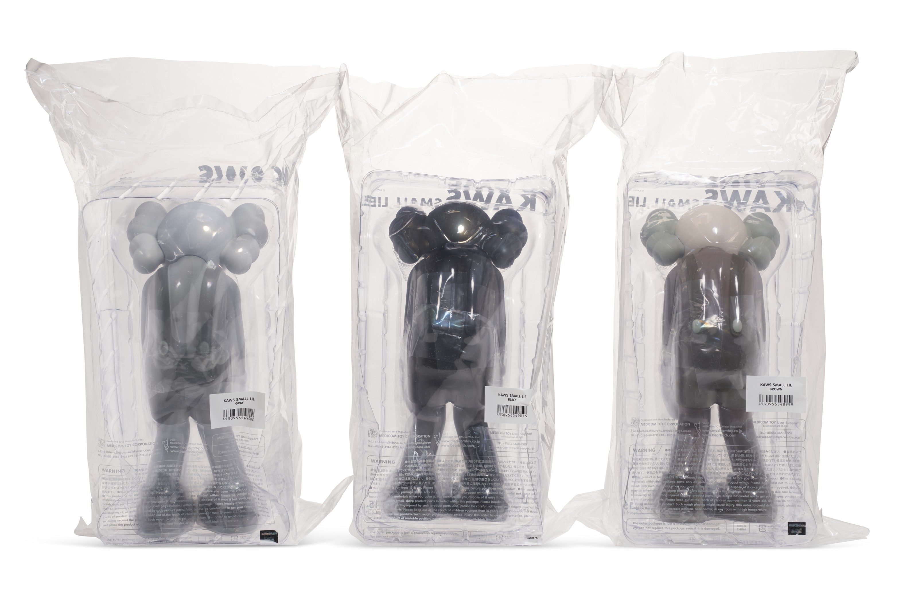 KAWS (B.1974), SMALL LIE (BROWN), SMALL LIE (BLACK), SMALL LIE 