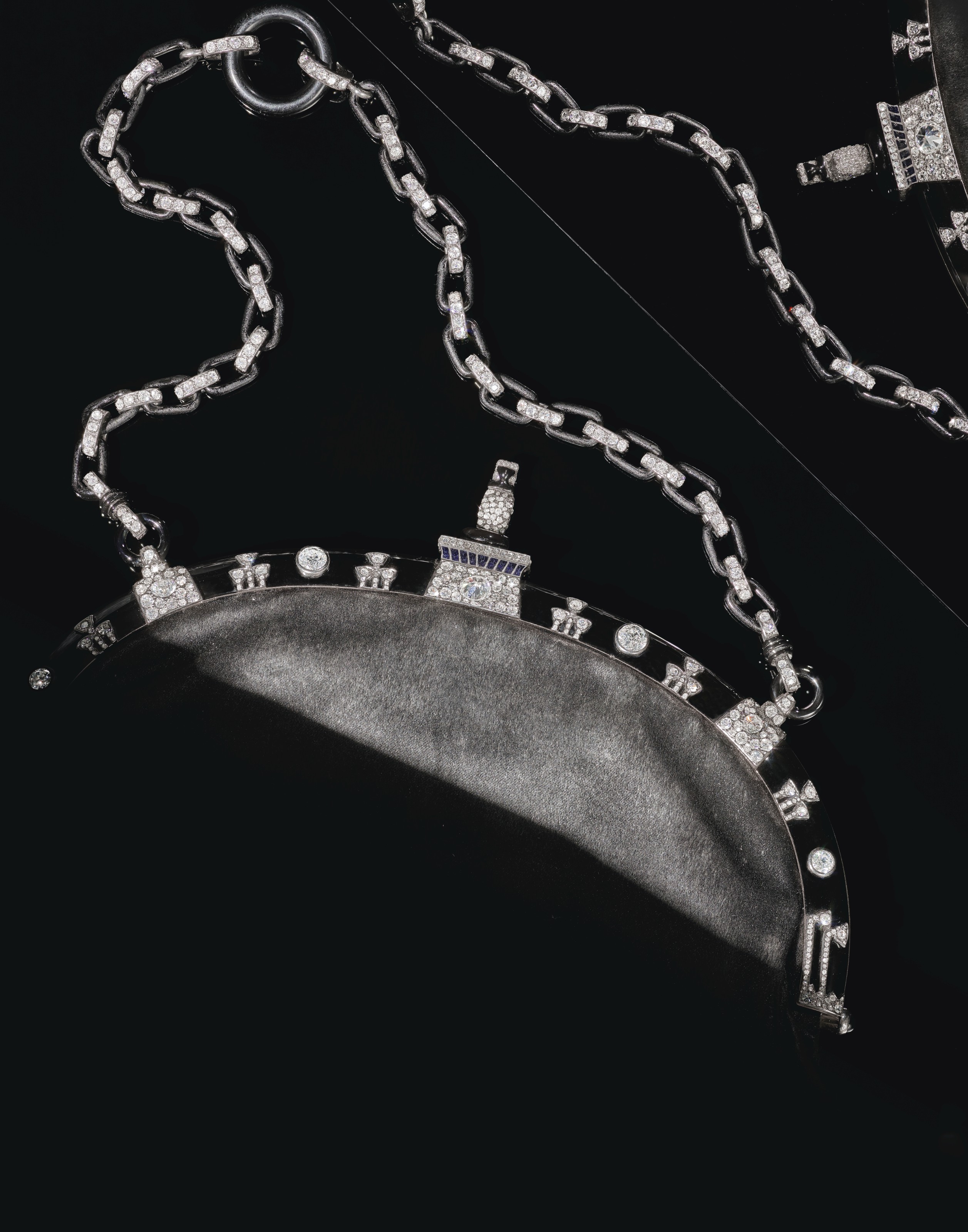 ART DECO EGYPTIAN REVIVAL DIAMOND, ONYX AND ENAMEL EVENING BAG, CARTIER Christie's