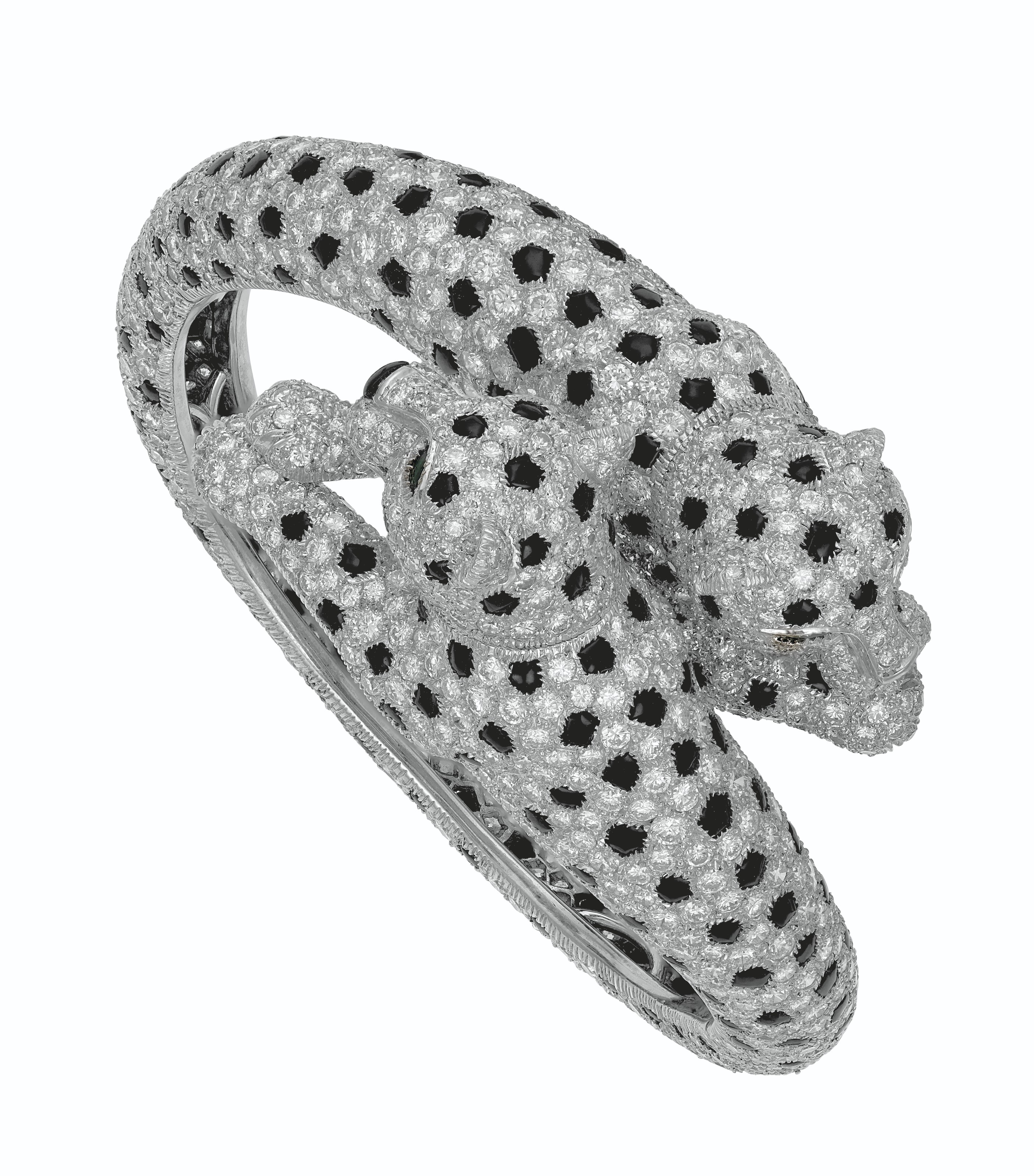 DIAMOND, ONYX AND EMERALD DOUBLE 'PANTHÈRE' BRACELET, CARTIER