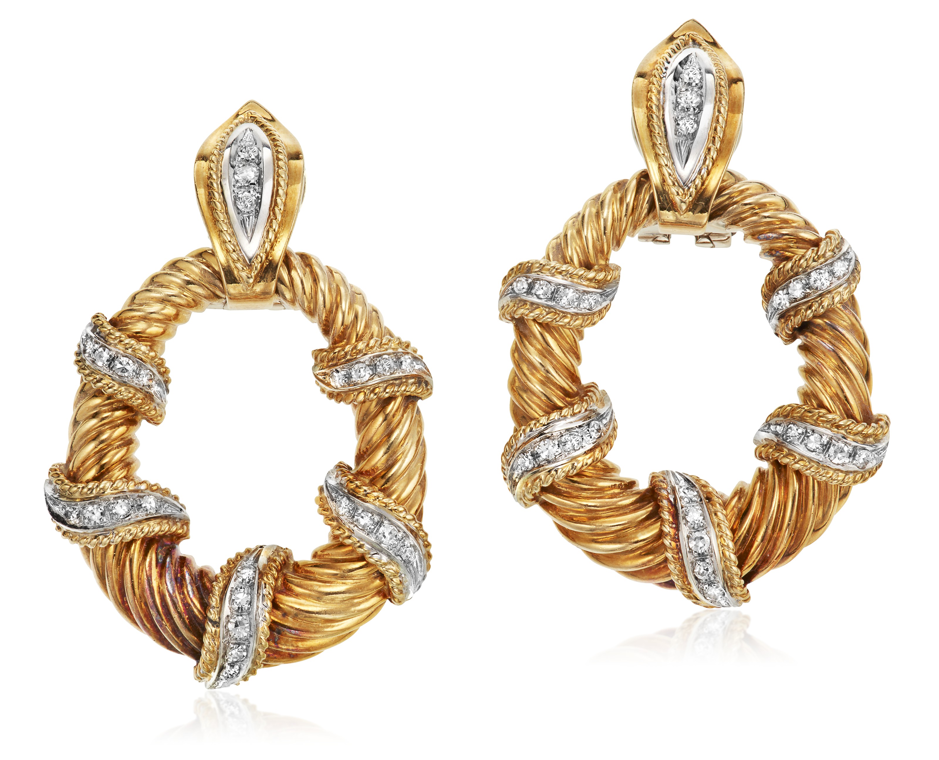 DIAMOND AND TWOTONE GOLD EARRINGS, Christie’s