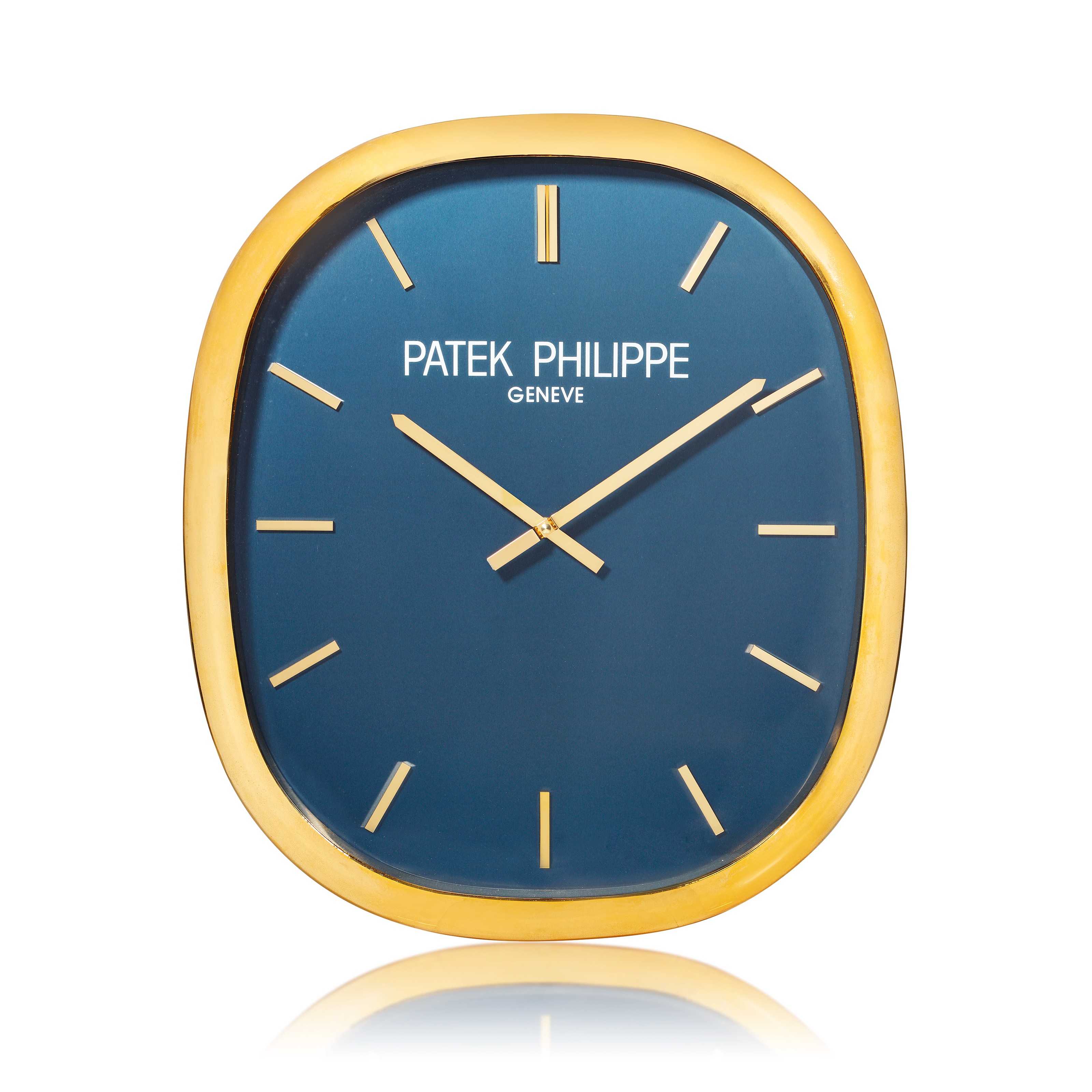 PATEK PHILIPPE / INDUCTA, LARGE GILT METAL WALL CLOCK, ELLIPSE MODEL