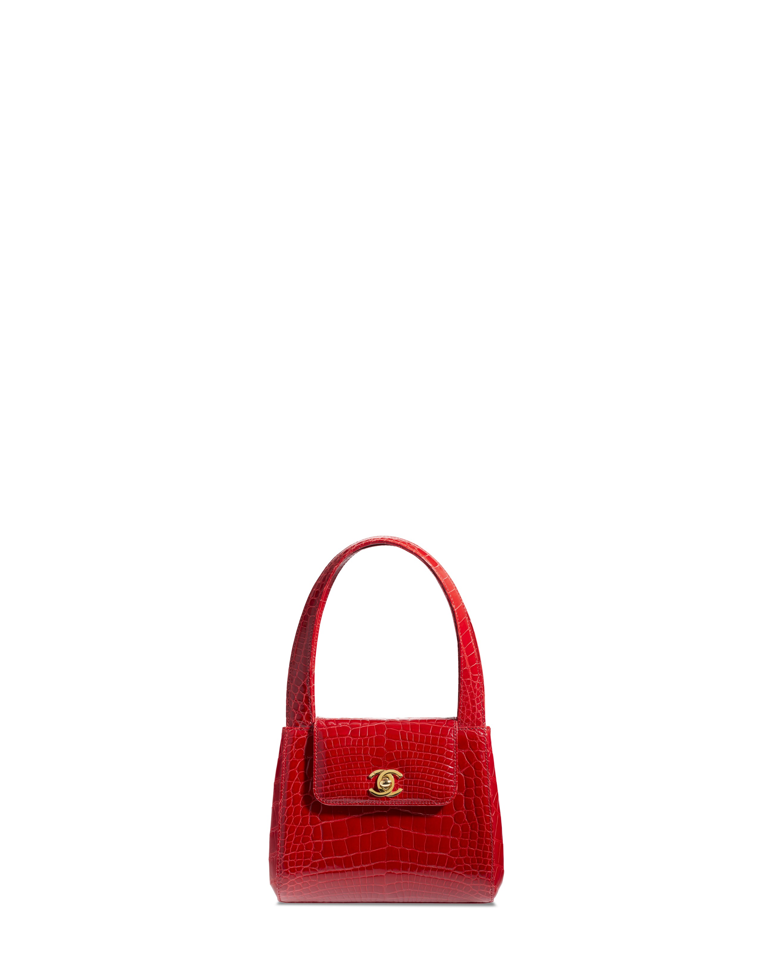 A SHINY RED CROCODILE TOP HANDLE BAG WITH GOLD HARDWARE