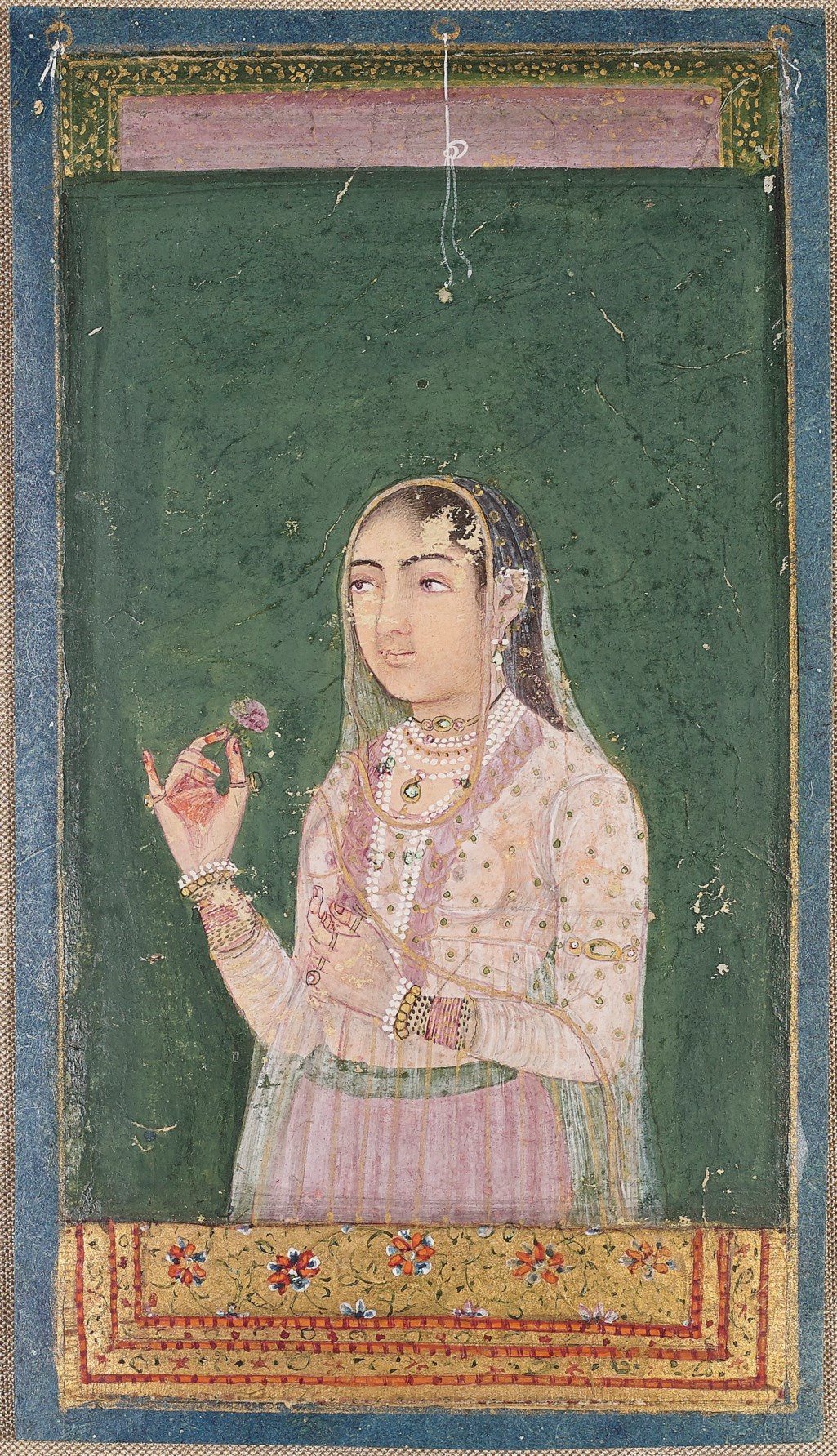 A Portrait Of A Lady Holding A Flower India Rajasthan Circa