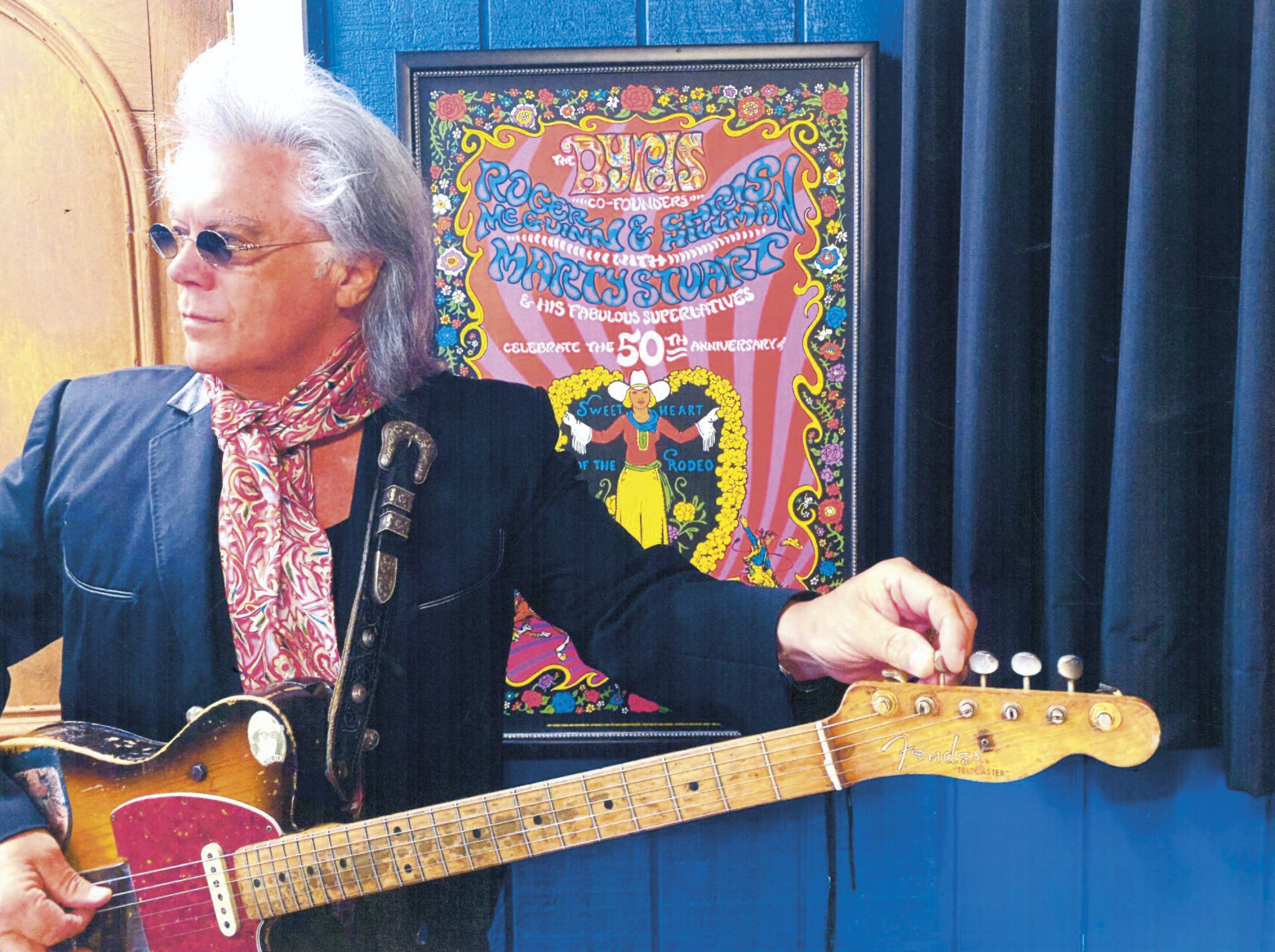 MARTY STUART, A SET OF FOUR PHOTOBOOKS, A BLACK AND WHITE PHOTOGRAPH OF