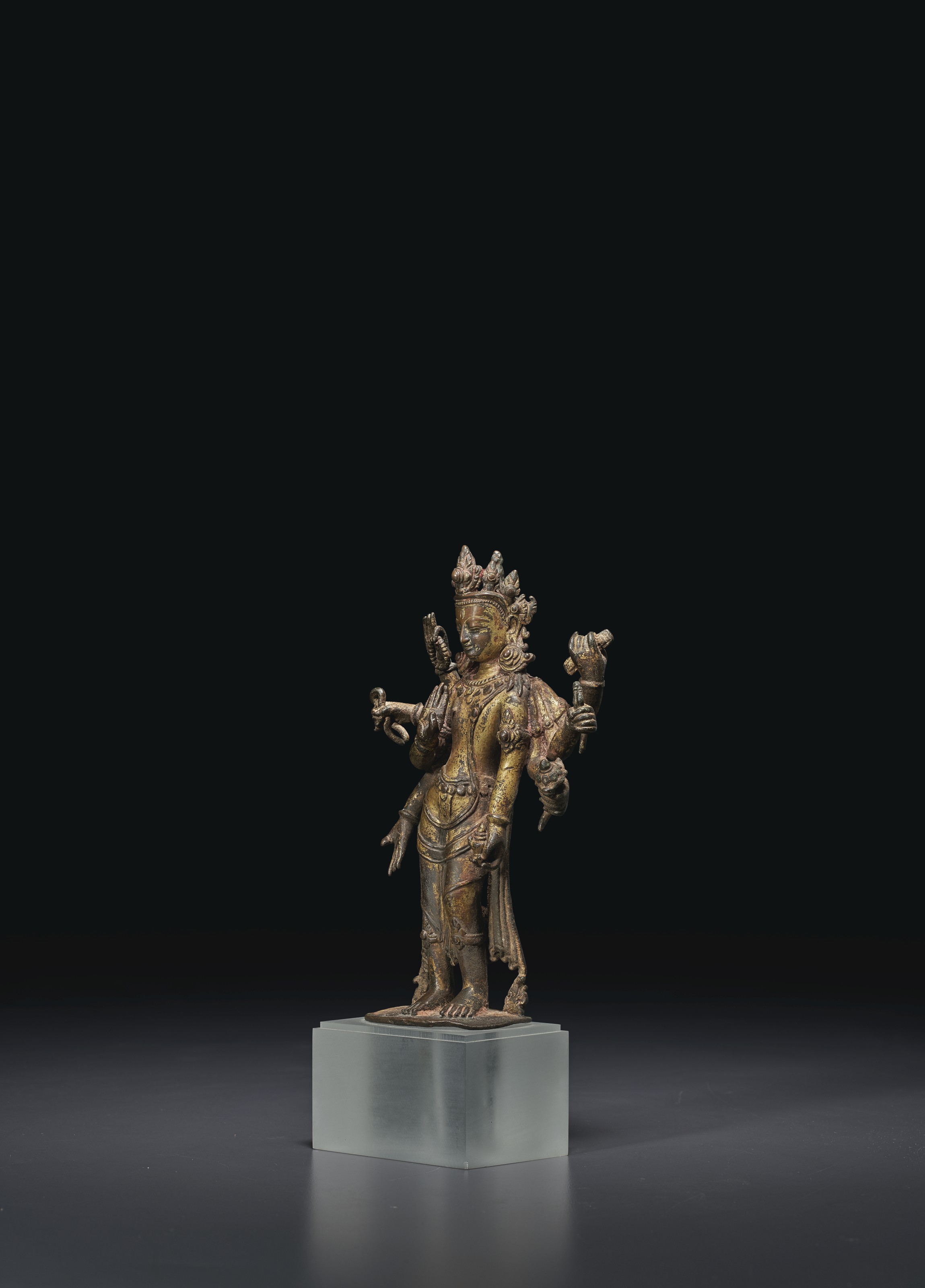 A GILTCOPPER FIGURE OF AMOGHAPASHA LOKESHVARA , NEPAL, MALLA PERIOD