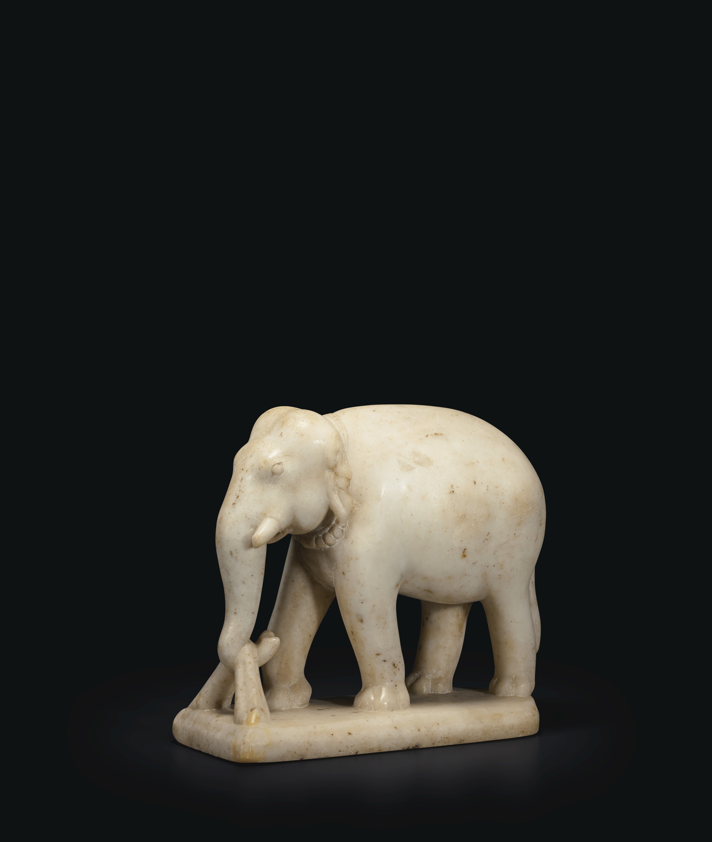 A WHITE MARBLE FIGURE OF AN ELEPHANT , INDIA, 18TH19TH CENTURY