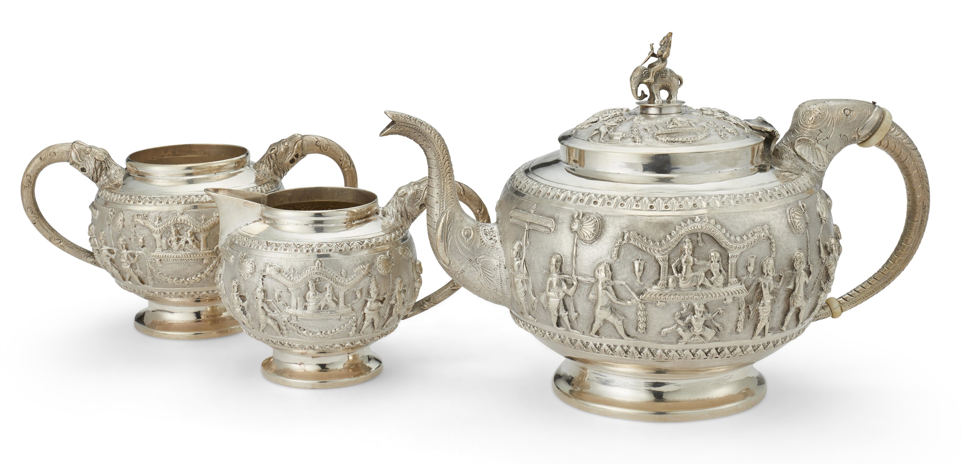 AN INDIAN SILVER THREEPIECE TEA SET, MADRAS, EARLY 20TH CENTURY