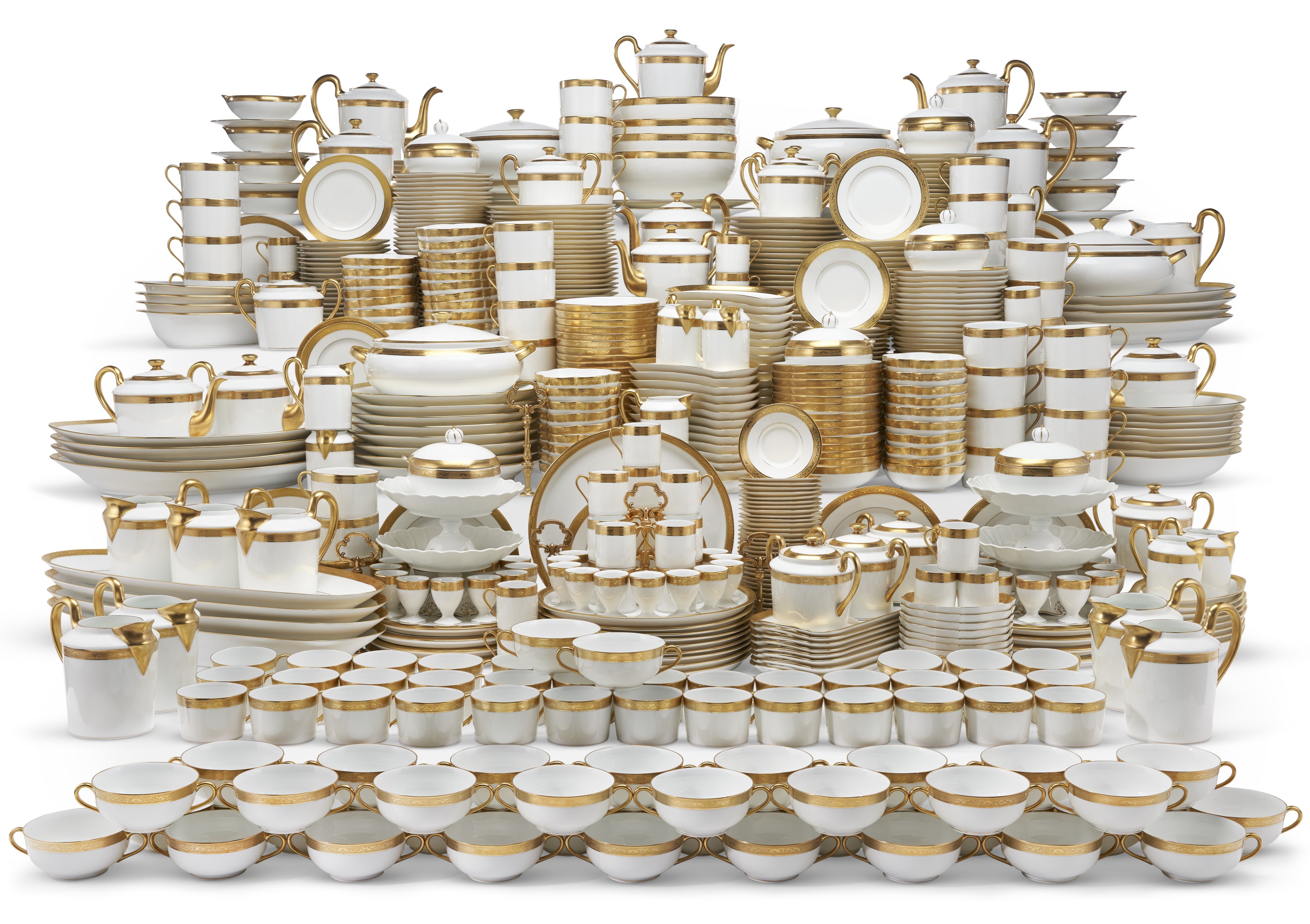 AN EXTENSIVE LIMOGES (RAYNAUD & CIE) PORCELAIN GILTWHITE PART SERVICE