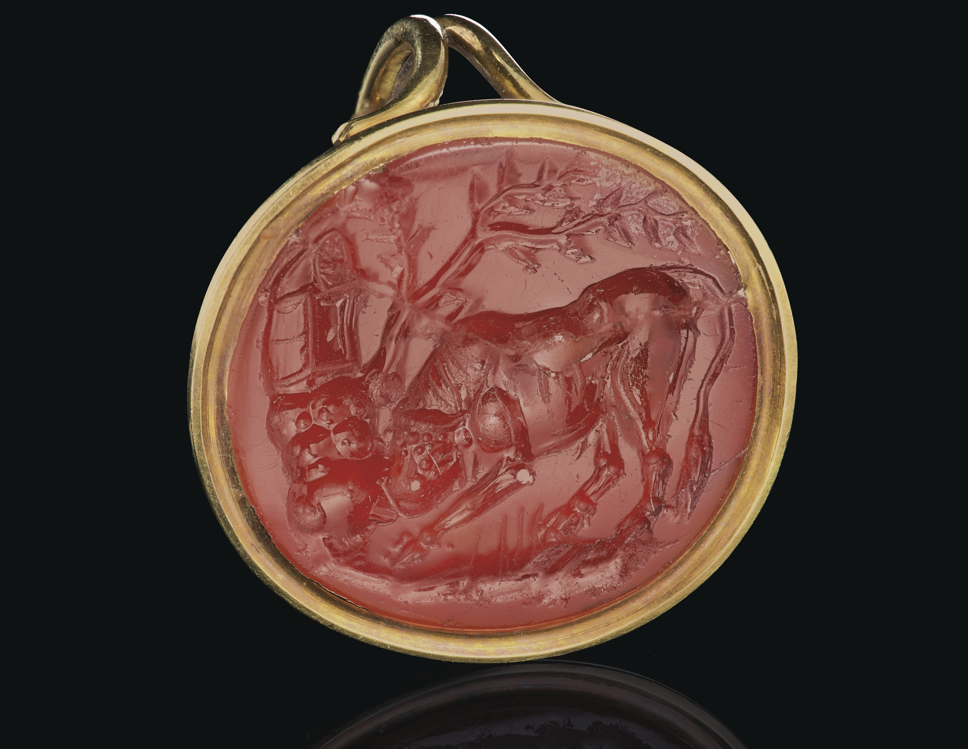 A ROMAN CARNELIAN RINGSTONE WITH A BULL, CIRCA 1ST CENTURY