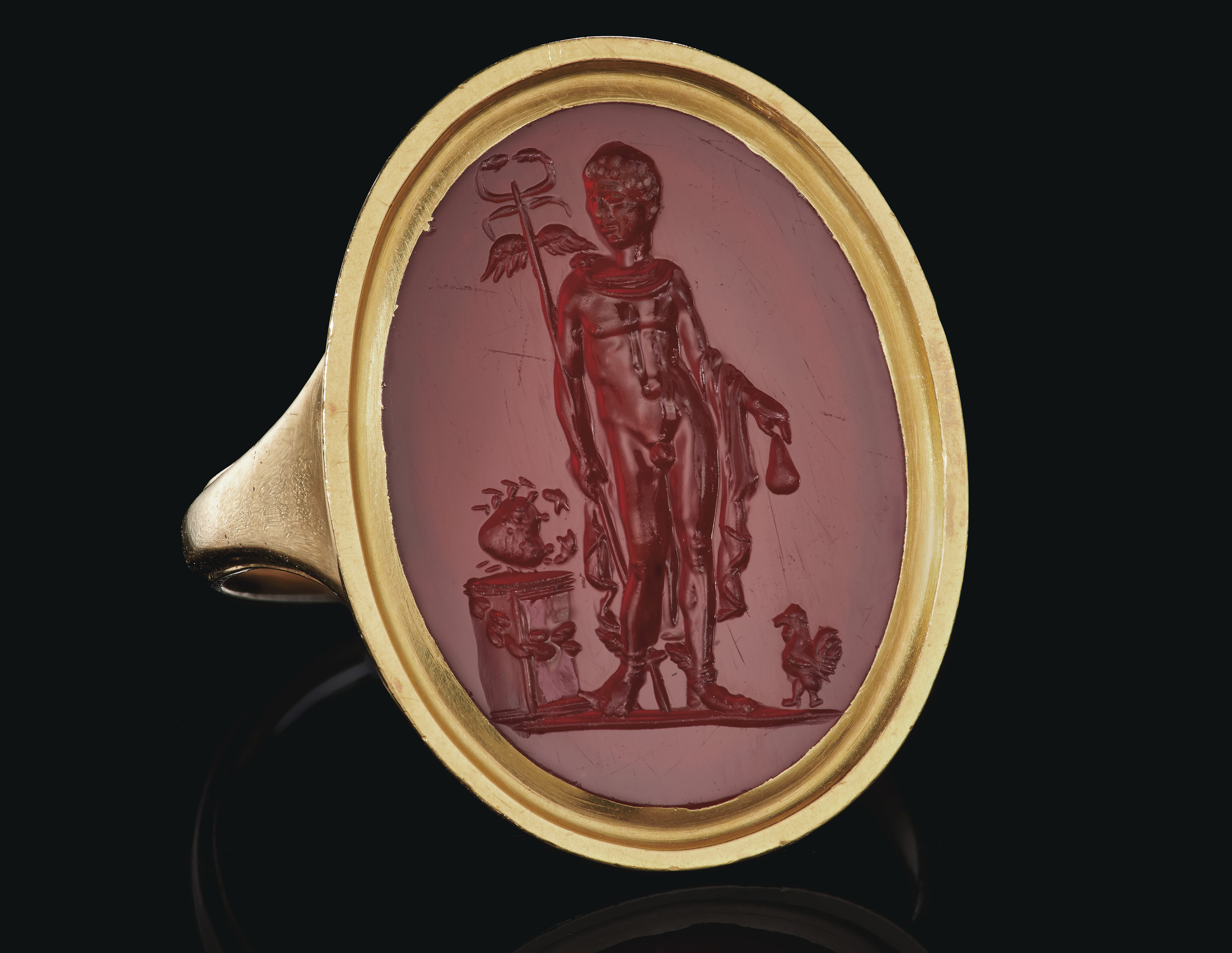 A ROMAN CARNELIAN RINGSTONE WITH MERCURY, CIRCA 1ST CENTURY A.D.