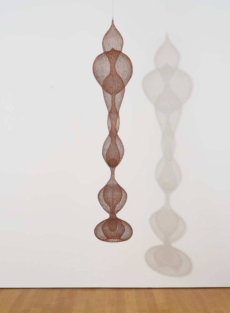 Ruth Asawa (1926-2013), Untitled (S.401, Hanging Seven-Lobed, Continuous Interlocking Form, with Spheres within Two Lobes), circa 1953-1954. Hanging sculpture — enamelled copper and brass wire. 78 x 15 x 15  in (198.1 x 38.1 x 38.1  cm). Sold for $5,382,500 in ONE A Global Sale of the 20th Century on 10 July 2020 at Christie’s in New York.© The Estate of Ruth Asawa  Artists