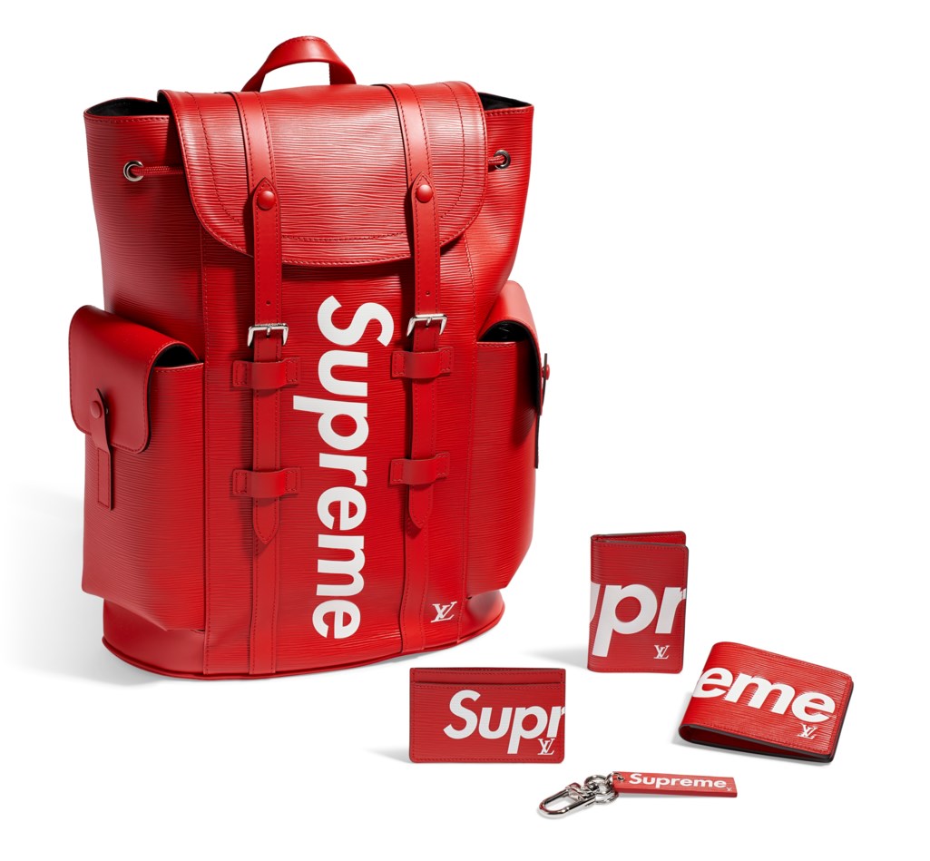 a red epi leather christopher pm backpack a collection of accessories