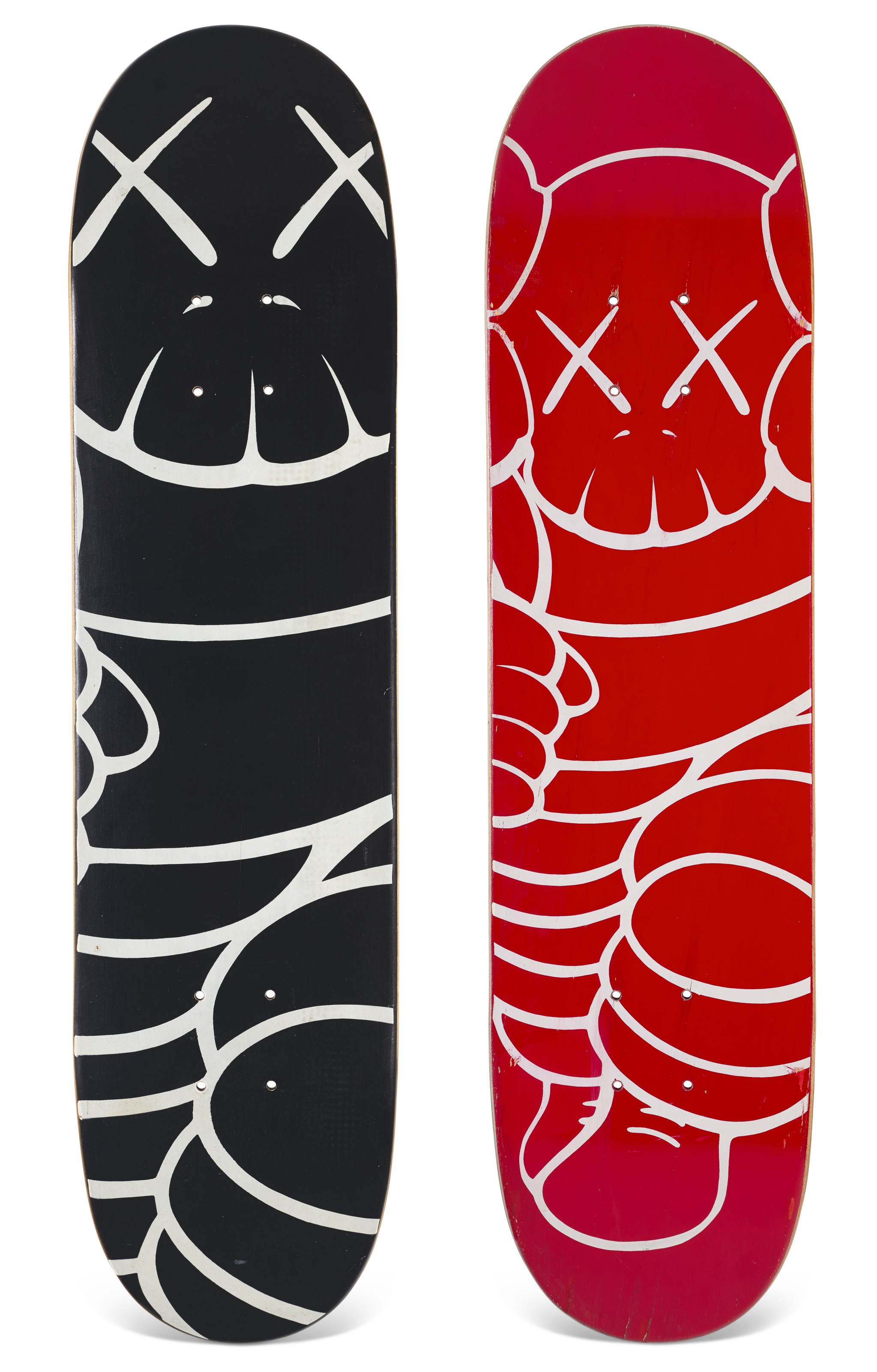 A set of signed KAWS CHUM skateboards, Supreme, 2001, sold for $30,000 on 15 December 2020 at Christie's Online