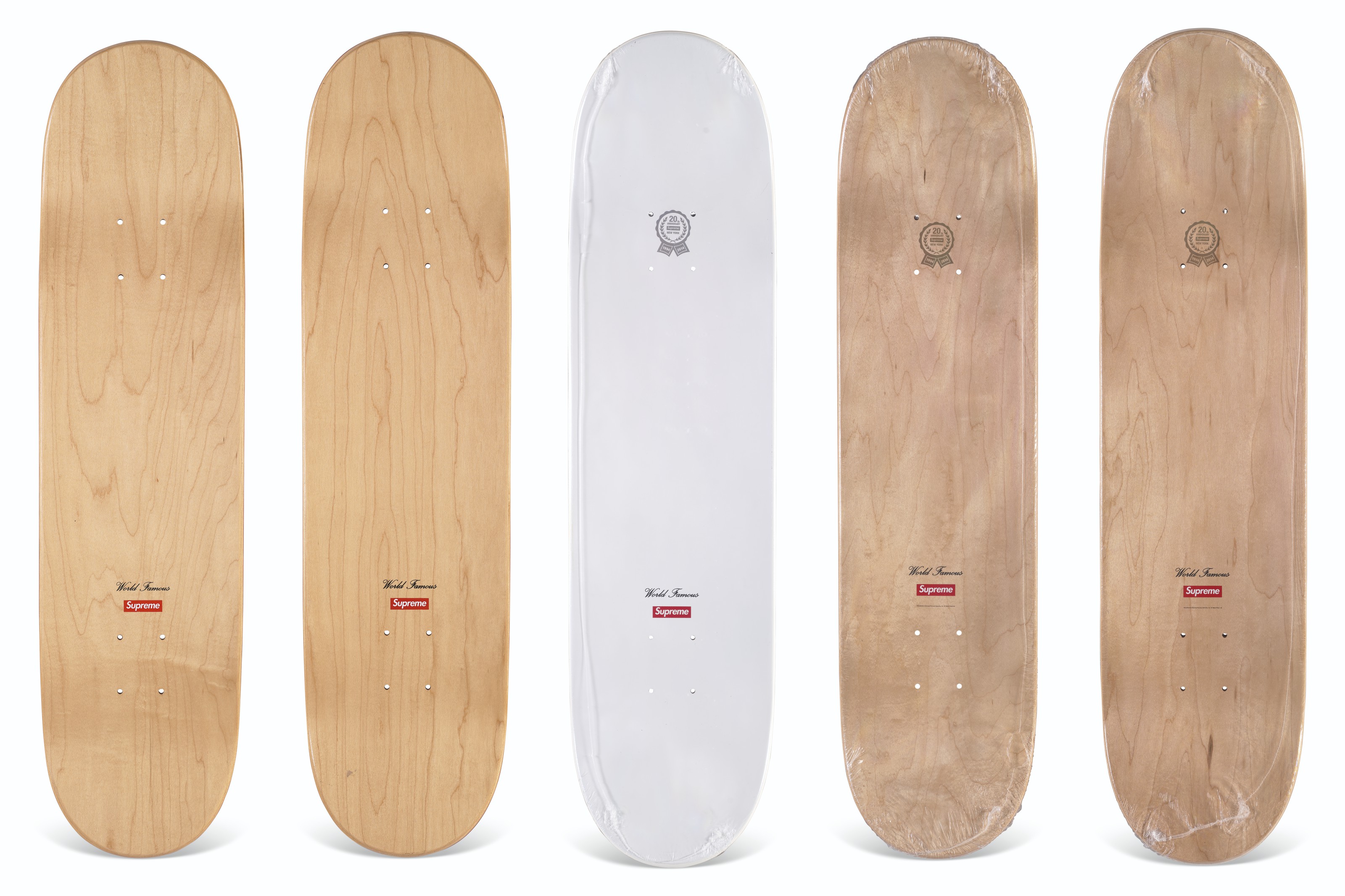 A COLLECTION OF STREET SCENE & 20TH ANNIVERSARY SKATEBOARDS