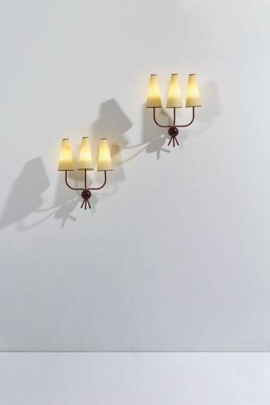 Jean Royère (1902-1981), Set of three sconces with three lights Hirondelle, the model created around 1948, these made 1962. Original Rhodoid  painted metal shades. 60 x 44 x 31 cm  23⅝ x 17⅜ x 12¼ in. Sold for €40,000 in Design on June 30 2020 at Christie’s in Paris