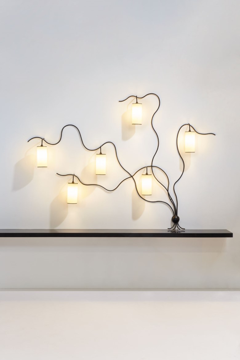 Jean Royère (1902-1981), Liane
six-light sconce, special order, 1962. Original Rhodoid  painted metal shades. 168 x 234 x 18 cm  66⅛ x 92⅛ x 7⅛ in. Sold for €1,570,000 in Design on June 30 2020 at Christie’s in Paris