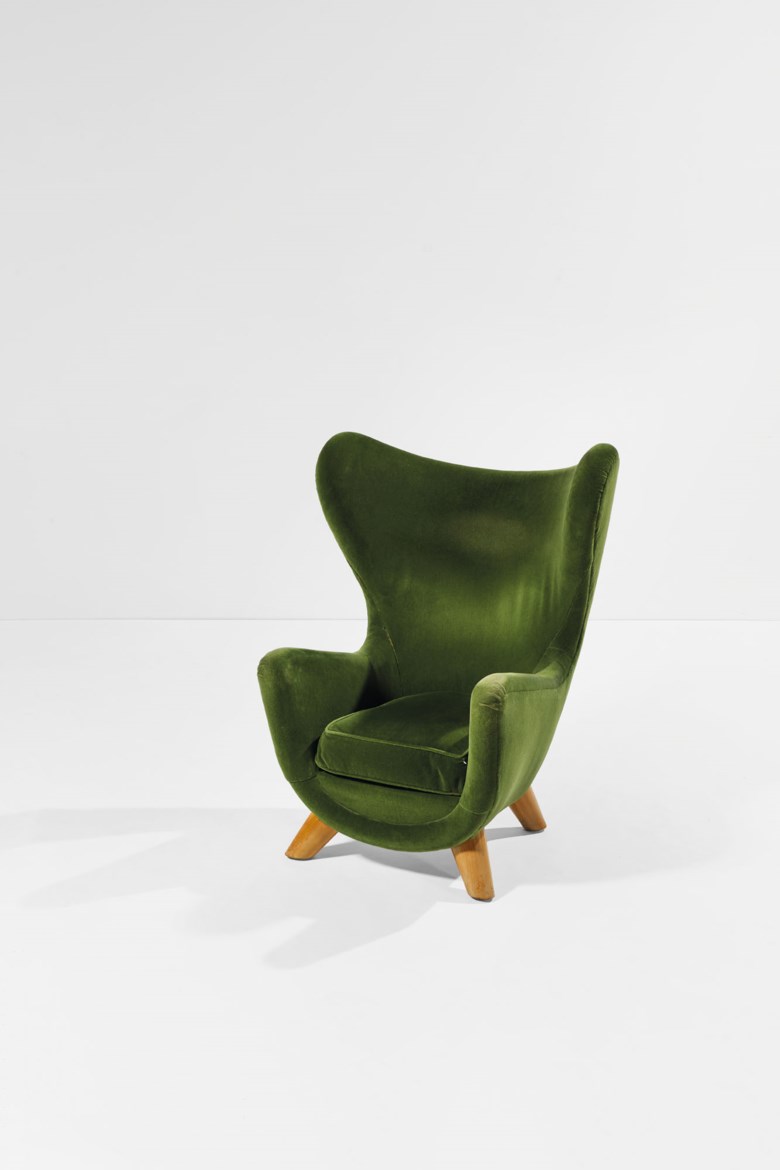 Jean Royère (1902-1981), Éléphanteau
armchair, high version, the model created around 1939, this one made in 1962. Original velvet upholstered ash wood. 108 x 86 x 86 cm  42½ x 33⅞ x 33⅞ in. Sold for €334,000 in Design on June 30 2020 at Christie’s in Paris