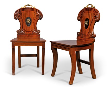 a pair of regency mahogany hall chairs