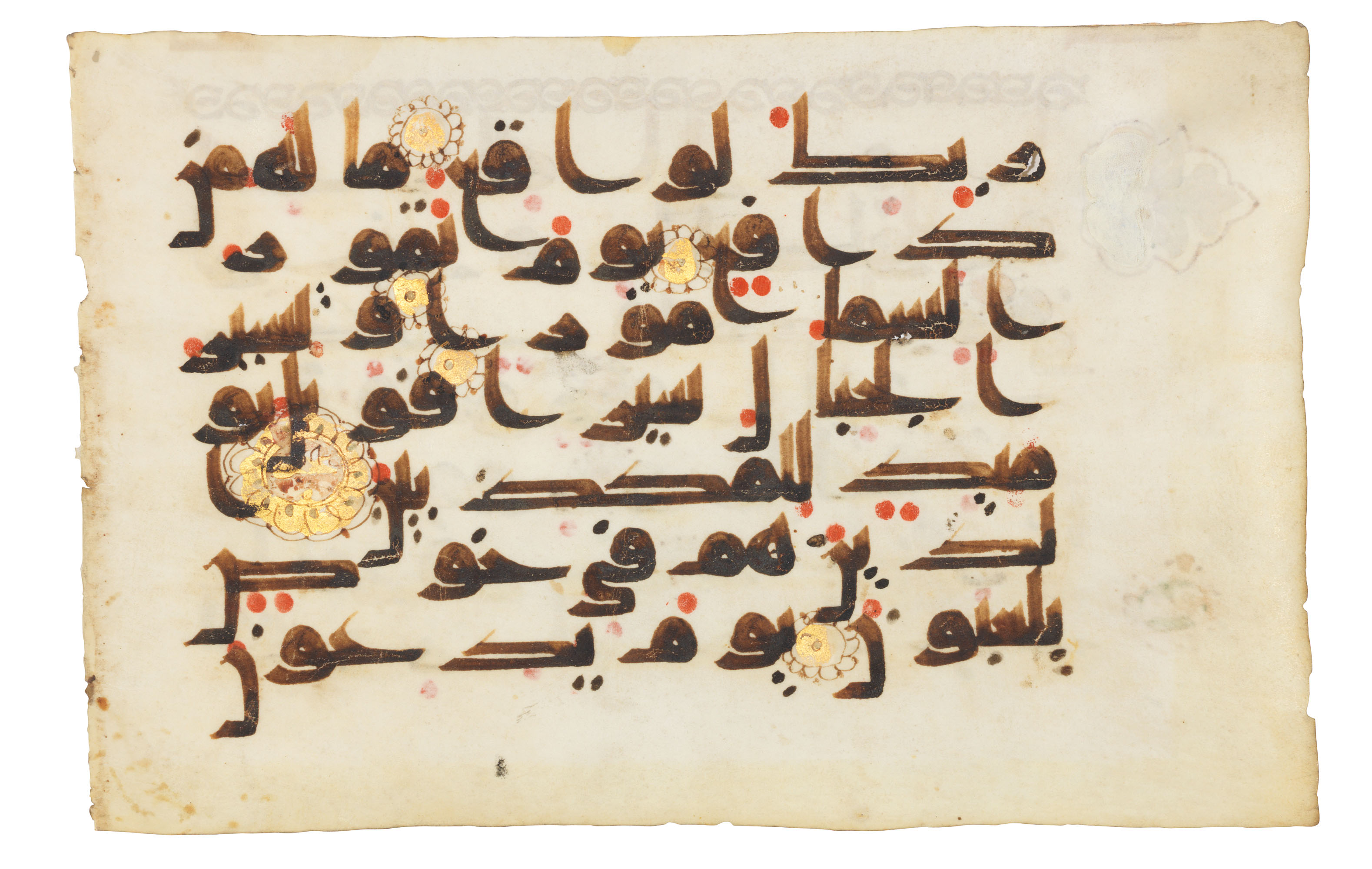 A Kufic Qur&rsquo;an folio, North Africa or Near East, 9th-10th century. Arabic manuscript on vellum. Folio: 5&frac12; x 8⅝ in (14 x 21.8 cm). Offered on 17 March-7 April 2021, Online