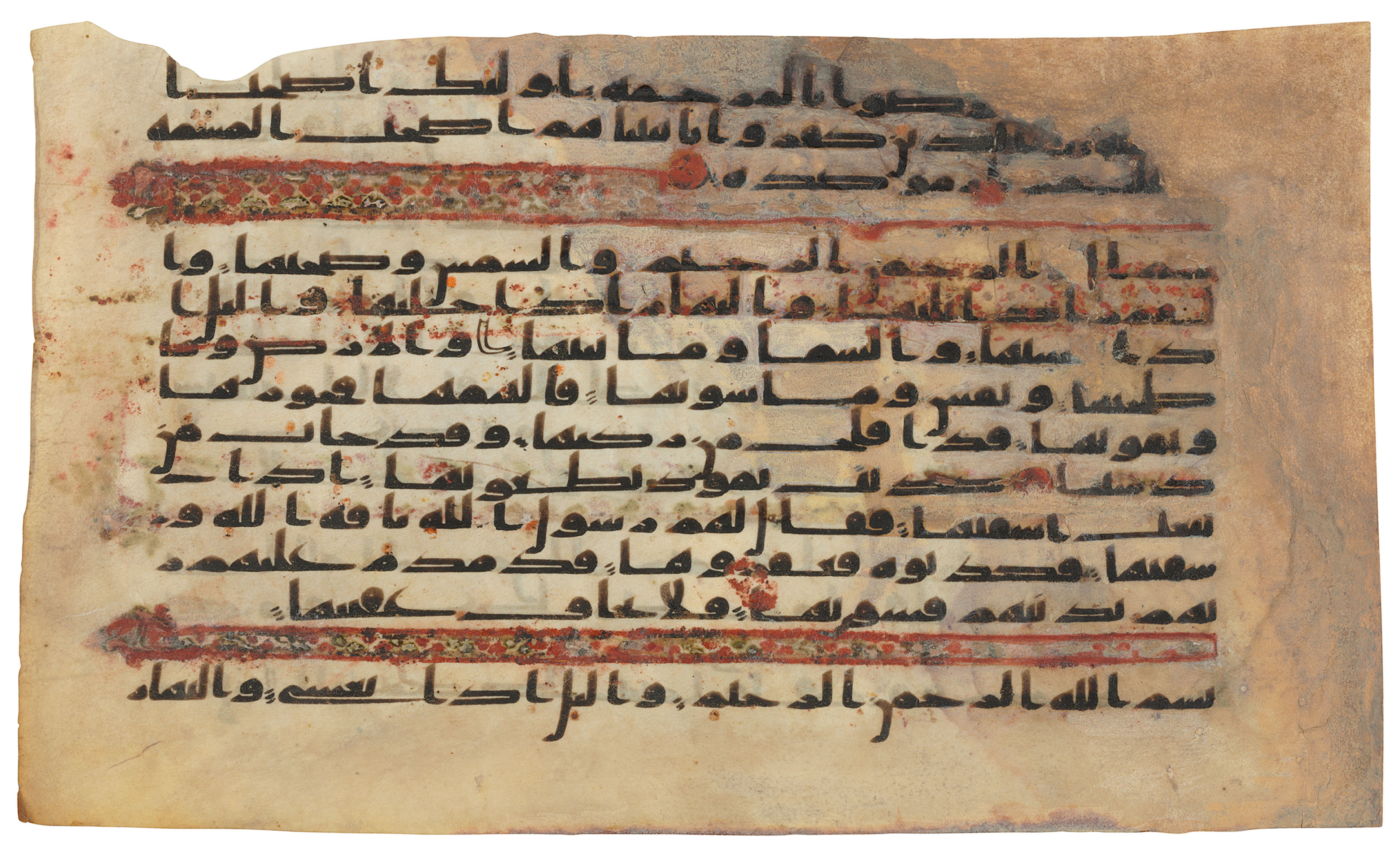AN EARLY KUFIC QUR'AN FOLIO, NEAR EAST OR NORTH AFRICA, SECOND