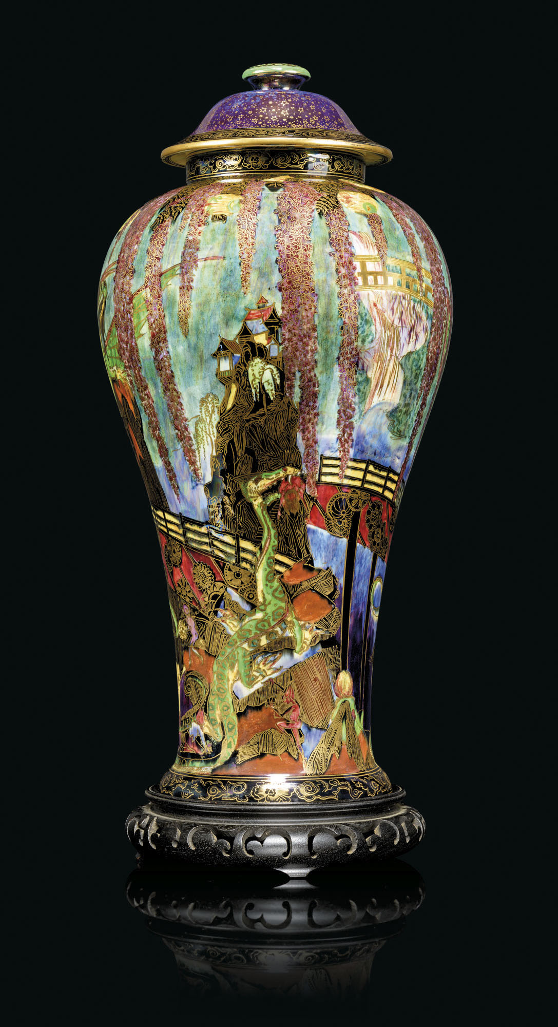 A large Wedgwood Fairyland Lustre &lsquo;Temple on a Rock&rsquo; vase and cover, circa 1925. 20&frac14; in (51.5 cm) high overall. Estimate: &pound;15,000-20,000. Offered in The Collector: Live on 19 May 2021 at Christie&rsquo;s in London