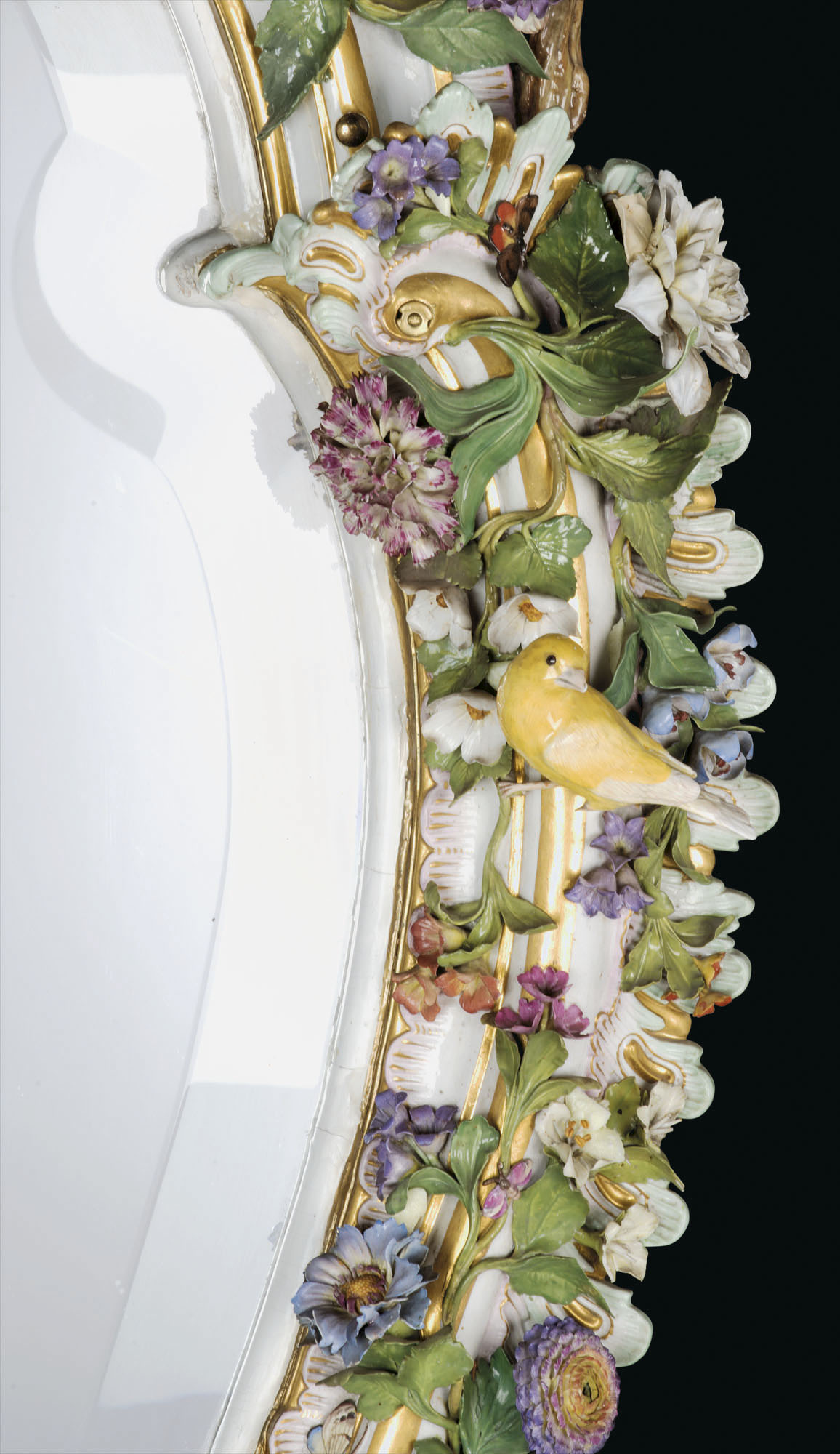 A MONUMENTAL MEISSEN PORCELAIN FLOWER-ENCRUSTED MIRROR FRAME, LATE